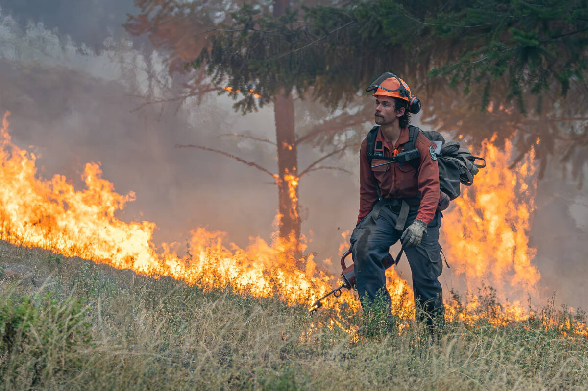 A BC Wildfire Service firefighter works on the McDougall Creek Fire in West Kelowna in 2023. (BCWS photo)
