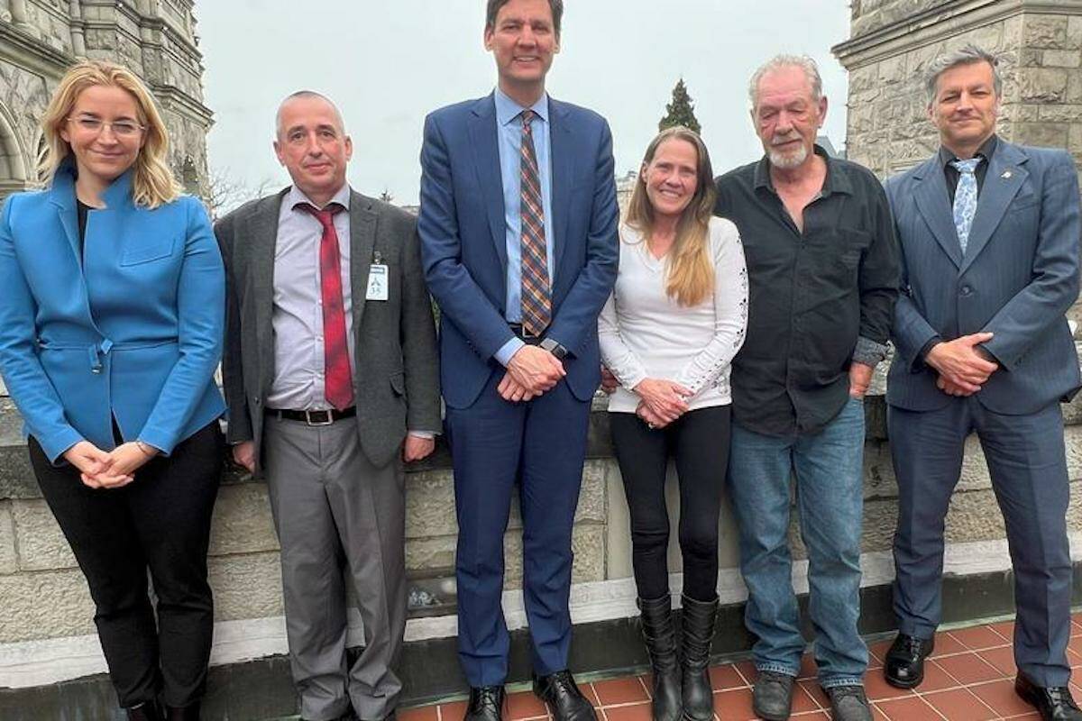 Chris Unrau was surrounded by political support when she travelled to Victoria to press the case for transplant patients. Premier David Eby and local MLA Roly Russell were there to back her up. (Contributed)
