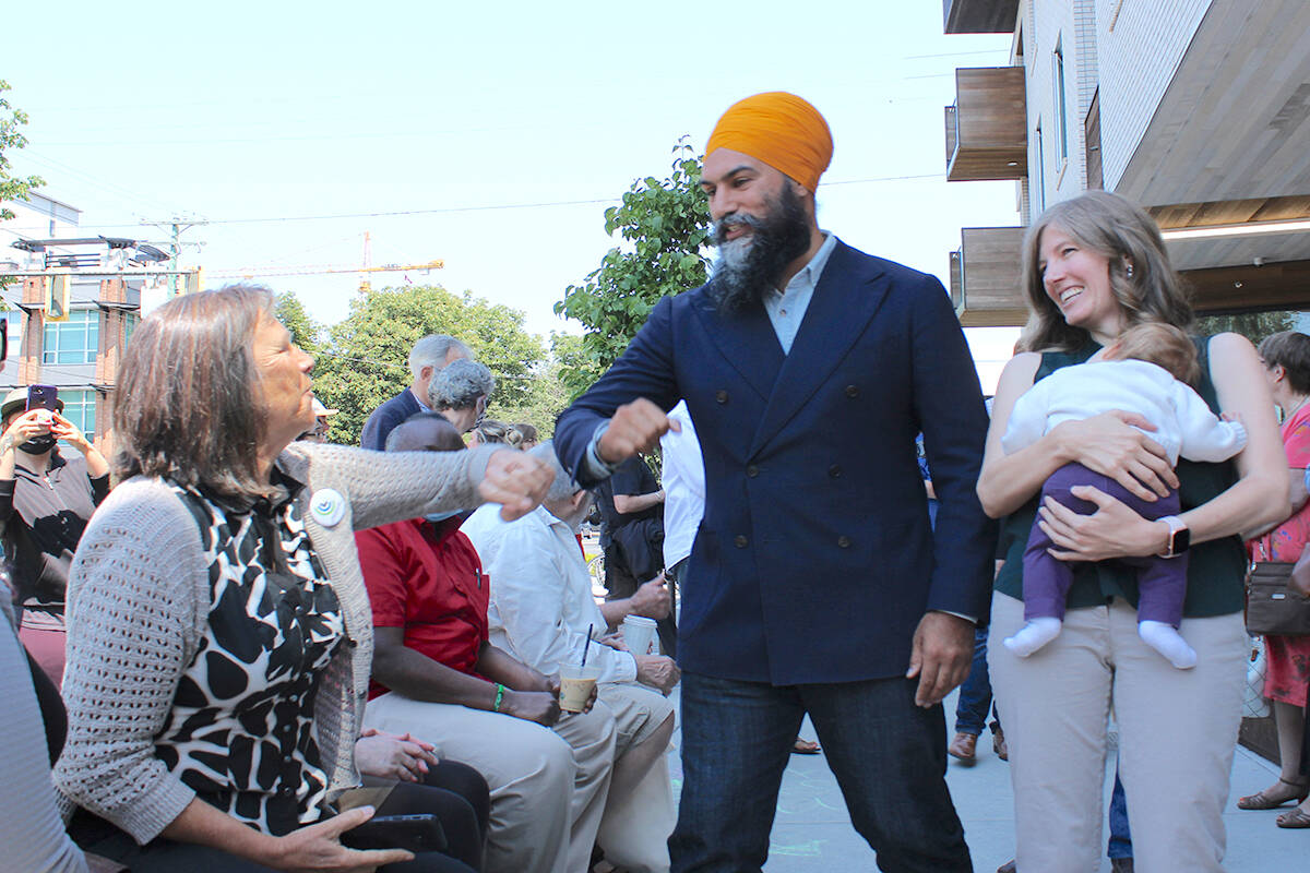 Victoria MP Laurel Collins says her party still supports the federal government’s consumer carbon pricing scheme. Pictured is NDP Leader Jagmeet Singh visiting Victoria alongside Collins in the summer of 2021. (Black Press Media file photo)