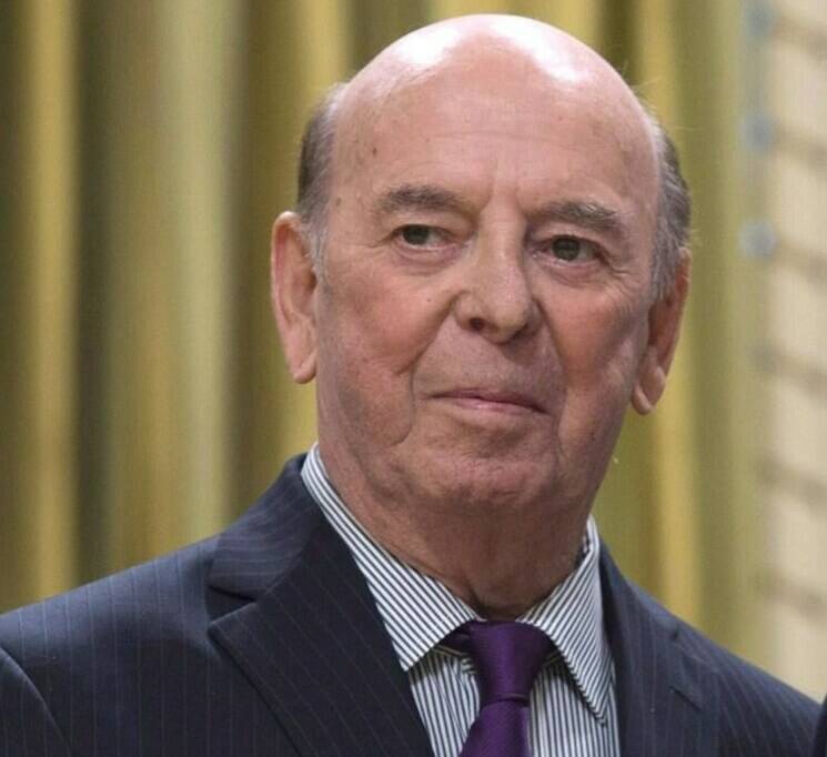 Bob Cole attends an Order of Canada ceremony at Rideau Hall, Friday Sept. 23, 2016 in Ottawa. Broadcaster Cole, a welcome voice for Canadian hockey fans for a half-century, has died at the age of 90. THE CANADIAN PRESS/Adrian Wyld