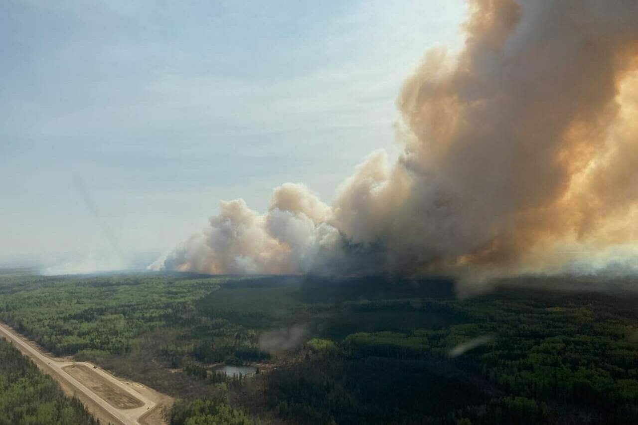 An out-of-control wildfire in northeastern British Columbia has triggered the province’s first evacuation of this year’s fire season. A wildfire burns in the Peace River Regional District of British Columbia in a May 5, 2023, handout photo. THE CANADIAN PRESS/HO-BC Wildfire Service