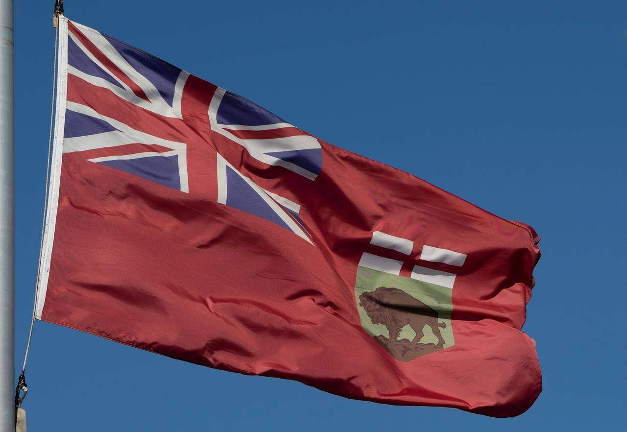 The flag of Manitoba flies in Ottawa, Monday, Nov. 1, 2021. A school trustee’s comments on Indigenous people and residential schools have led to condemnation from many quarters and a review by the Manitoba government. 
THE CANADIAN PRESS/Adrian Wyld