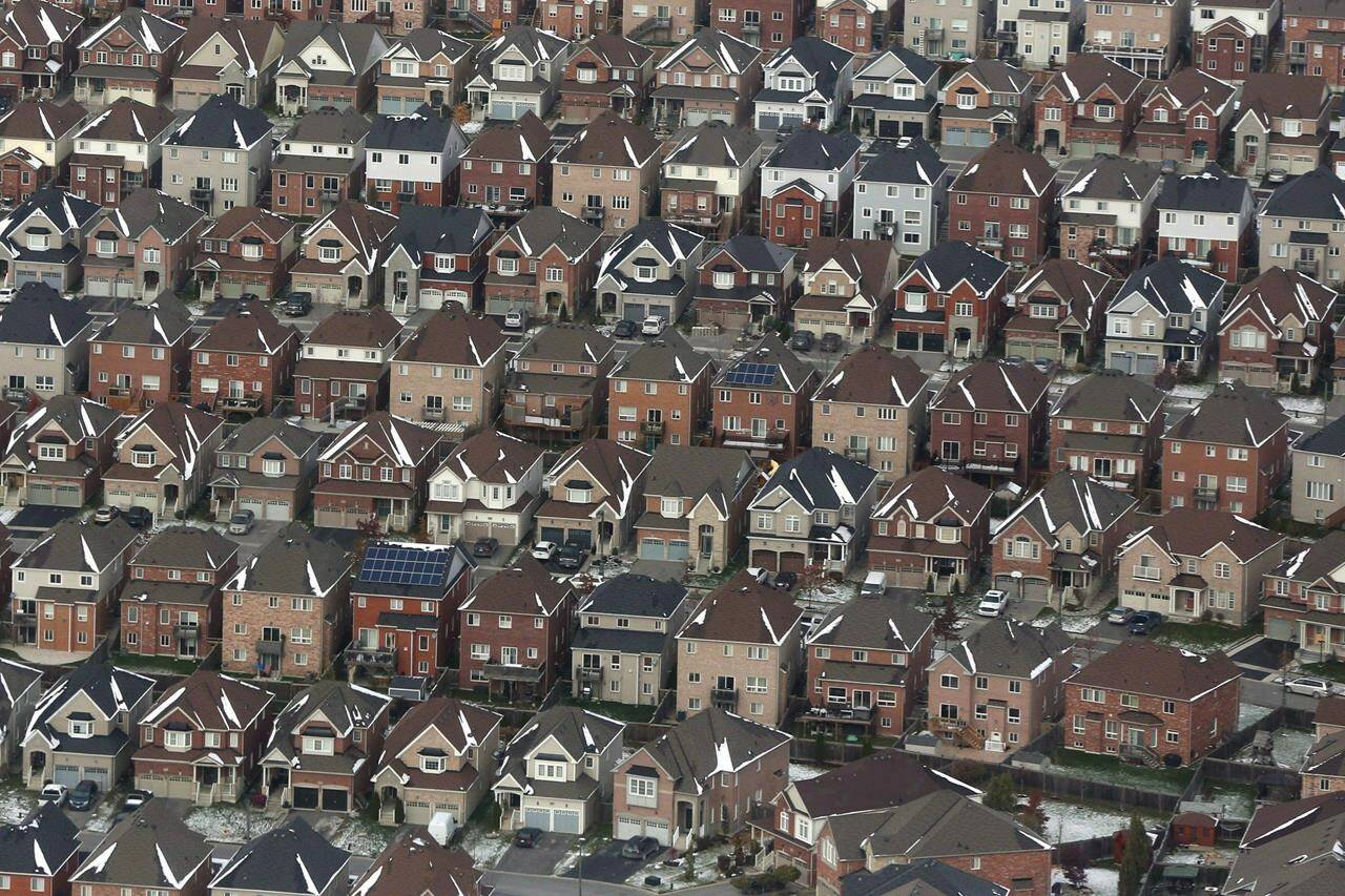 As more Canadians find themselves struggling to afford or find housing, the country’s smallest province is the only one that can point to legislation recognizing housing as a human right. An aerial view of houses in Oshawa, Ont., is shown on Saturday, Nov. 11, 2017. THE CANADIAN PRESS/Lars Hagberg