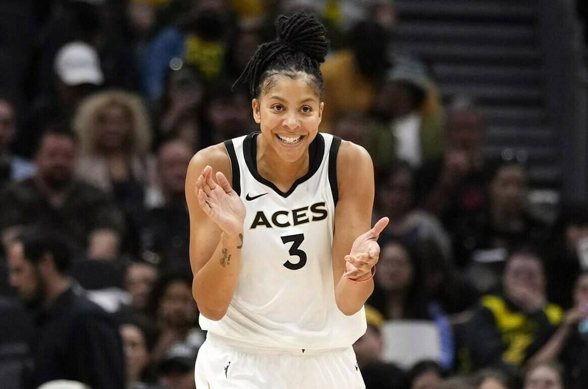 FILE - Las Vegas Aces forward Candace Parker reacts during the first half of a WNBA basketball game against the Seattle Storm, May 20, 2023, in Seattle. The three-time WNBA champion has announced she’s retiring. Parker, a two-time league MVP, announced in a social media post on Sunday, April 28, 2024 that she’s ending her career after 16 seasons. (AP Photo/Lindsey Wasson, File)
