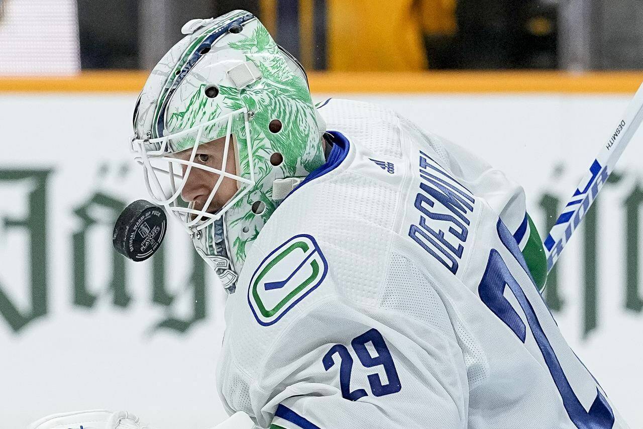 Vancouver Canucks goaltender Casey DeSmith (29) warms up before the start of Game 3 in an NHL hockey Stanley Cup first-round playoff series against the Nashville Predators, in Nashville, Tenn., Friday, April 26, 2024. THE CANADIAN PRESS/AP-George Walker IV