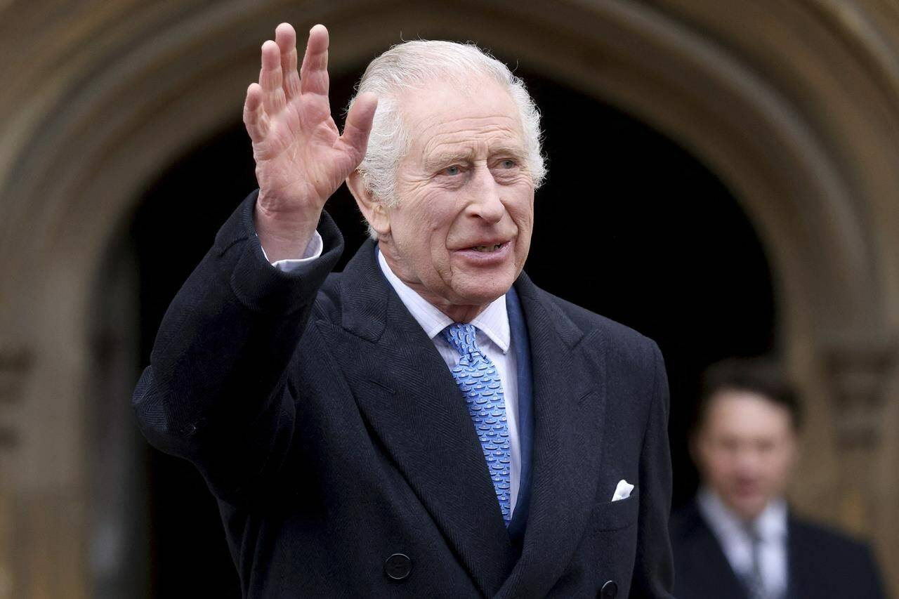 FILE - Britain’s King Charles III waves as he leaves after attending the Easter Matins Service at St. George’s Chapel, Windsor Castle, England, March 31, 2024. Buckingham Palace says King Charles III will resume his public duties next week following treatment for cancer. The announcement on Friday April 26, 2024, comes almost three months after Charles took a break from public appearances to focus on his treatment for an undisclosed type of cancer. (Hollie Adams/Pool Photo via AP, File)