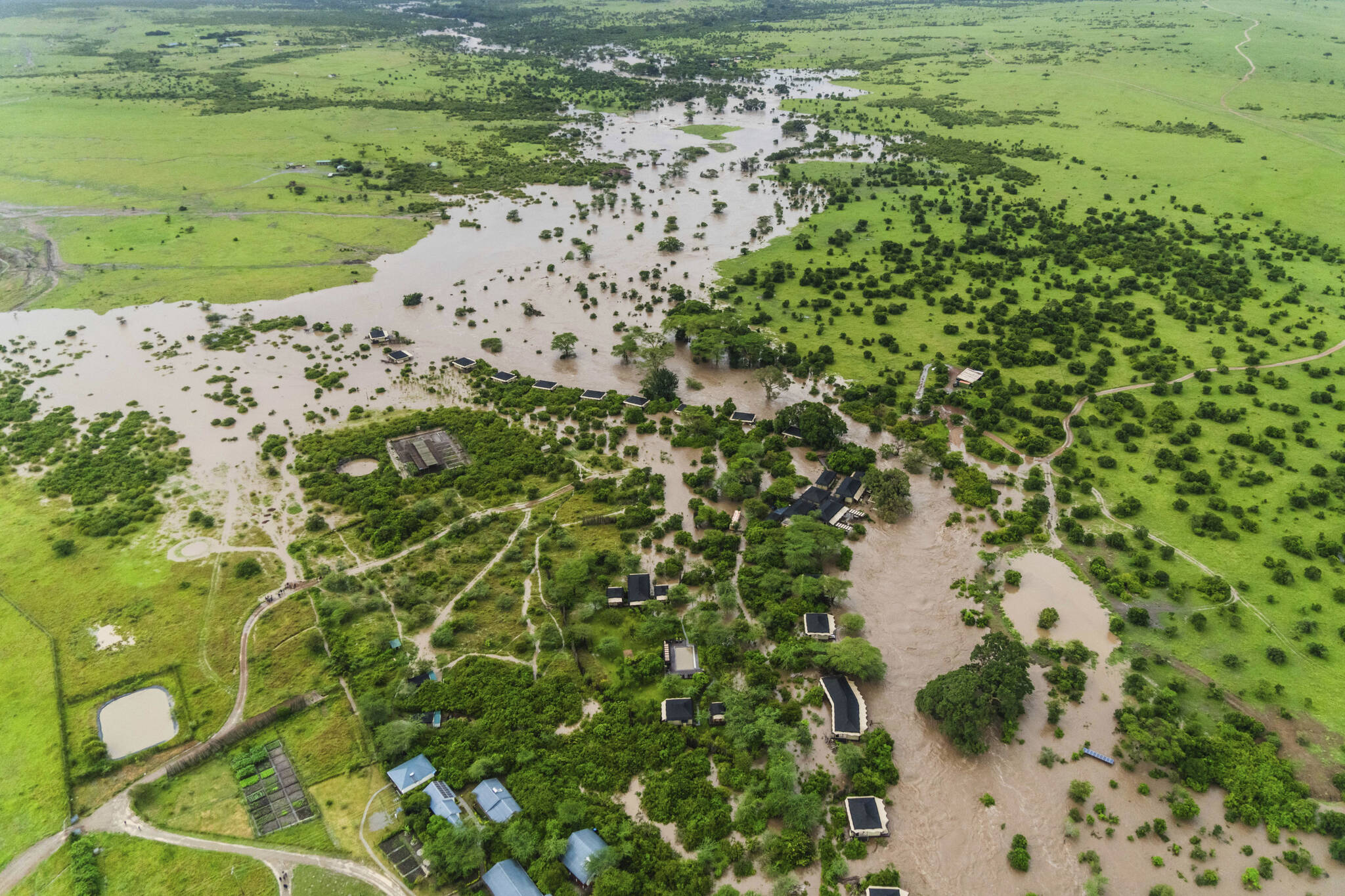 Aerial view of flooded Maasai Mara National Reserve, that left dozens of tourists stranded in Narok County, Kenya, Wednesday, May 1, 2024. Kenya, along with other parts of East Africa, has been overwhelmed by flooding. (AP Photo/Bobby Neptune)