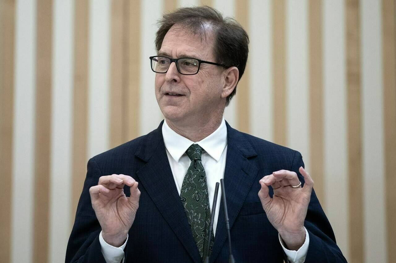 British Columbia Health Minister Adrian Dix says the province is providing more funding to recruit and retain more health-care workers. Dix speaks during an announcement at the Royal Inland Hospital in Kamloops, B.C., on Thursday, Feb. 8, 2023. THE CANADIAN PRESS/Marissa Tiel