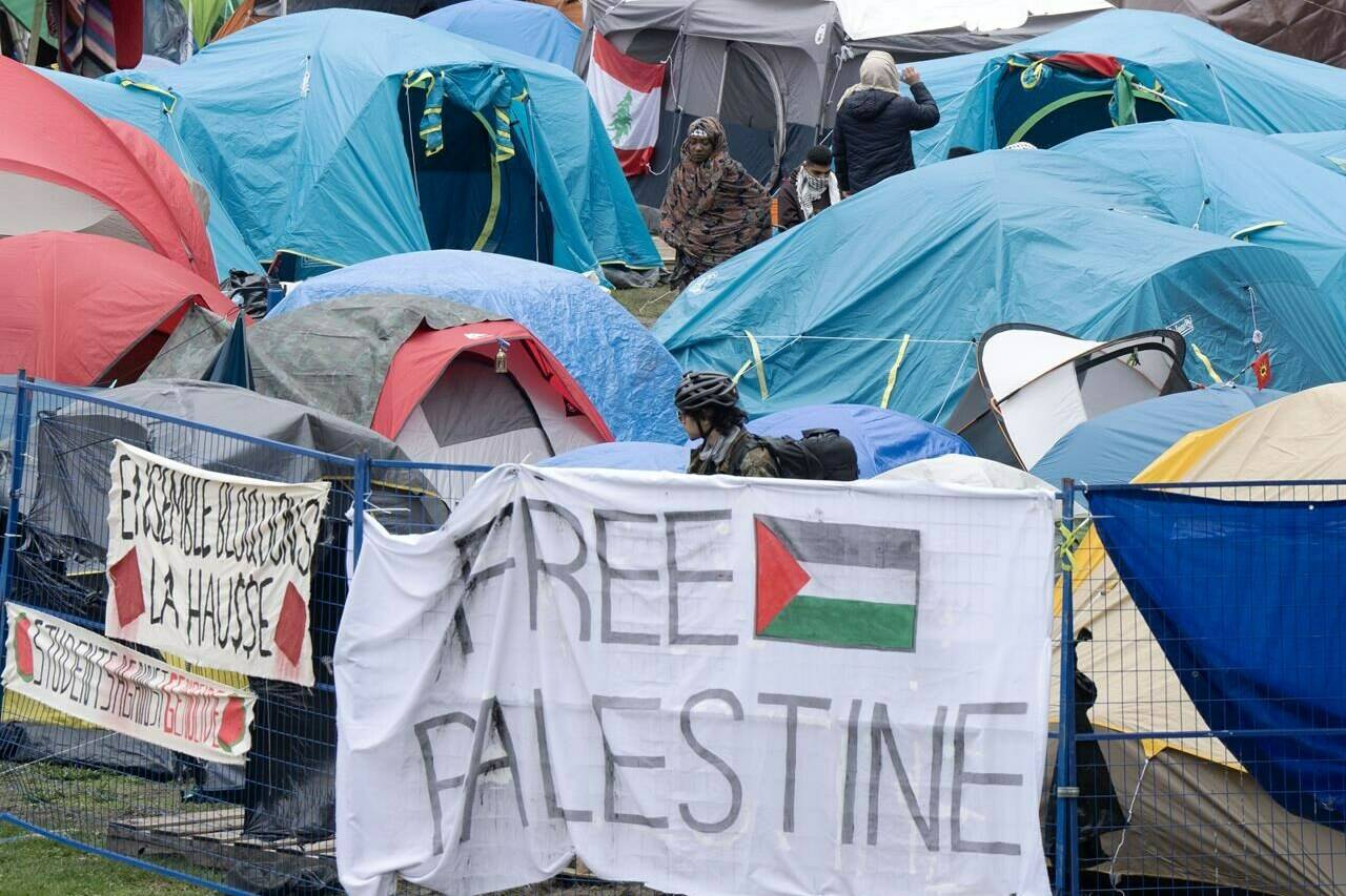 Among the demands of pro-Palestinian activists, many of whom have set up protest encampments on university campuses in Canada and the United States, is for Israeli universities to be isolated. Pro-Palestinian activists at their encampment on the McGill University campus in Montreal, Wednesday, May 1, 2024. THE CANADIAN PRESS/Ryan Remiorz