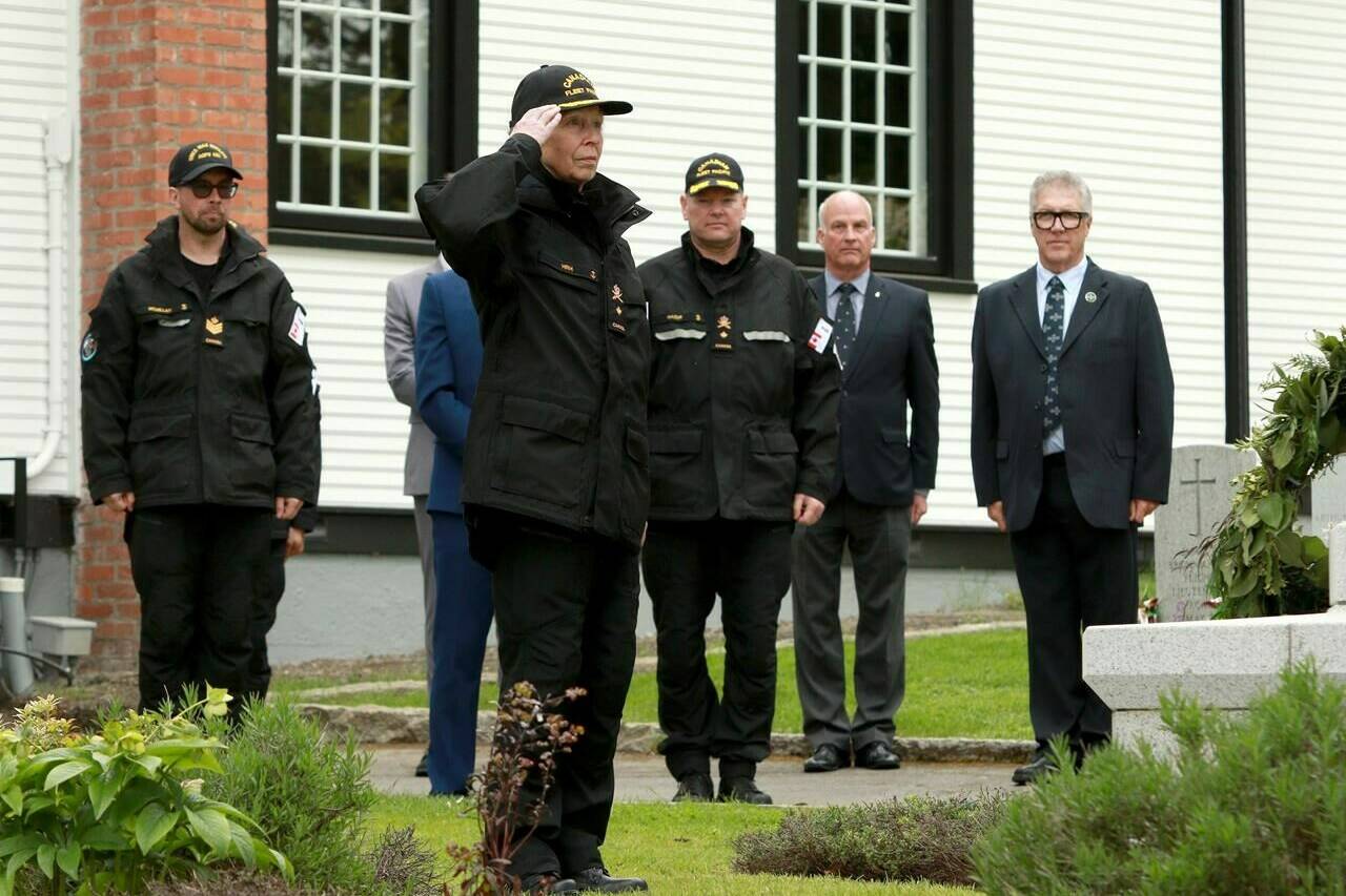 Princess Anne salutes after laying a commemorative wreath following a tour at the God’s Acre cemetery at Esquimalt, B.C., on Saturday, May 4, 2024. THE CANADIAN PRESS/Chad Hipolito