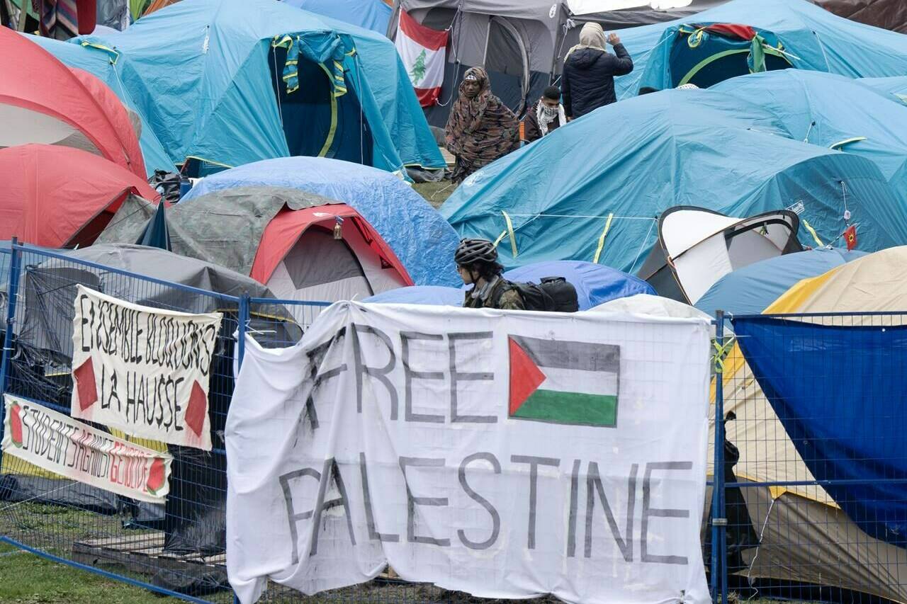 A group of pro-Palestinian protesters who have set up dozens of tents at McGill University’s downtown Montreal campus say they’re better organized and prepared than ever as the protest stretches into a second week. Pro-Palestinian activists at their encampment on the McGill University campus in Montreal, Wednesday, May 1, 2024. THE CANADIAN PRESS/Ryan Remiorz