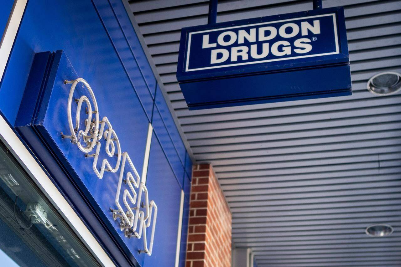 The open sign at a London Drugs is turned off in Vancouver on Monday, April. 29, 2024. London Drugs is gradually reopening its stores across Western Canada, with dozens reopening, about a week after a cybersecurity incident forced them to close. THE CANADIAN PRESS/Ethan Cairns