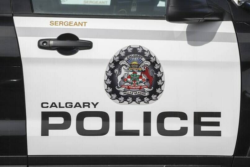 Alberta's police watchdog says a Calgary officer has been charged over an alleged assault at the arrest processing centre two years ago. Police vehicles at Calgary Police Service headquarters in Calgary, Alta., on April 9, 2020. THE CANADIAN PRESS/Jeff McIntosh