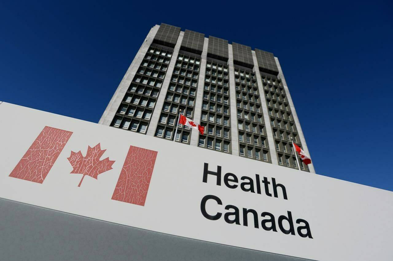 A sign is displayed in front of Health Canada headquarters in Ottawa on Friday, January 3, 2014. THE CANADIAN PRESS/Sean Kilpatrick