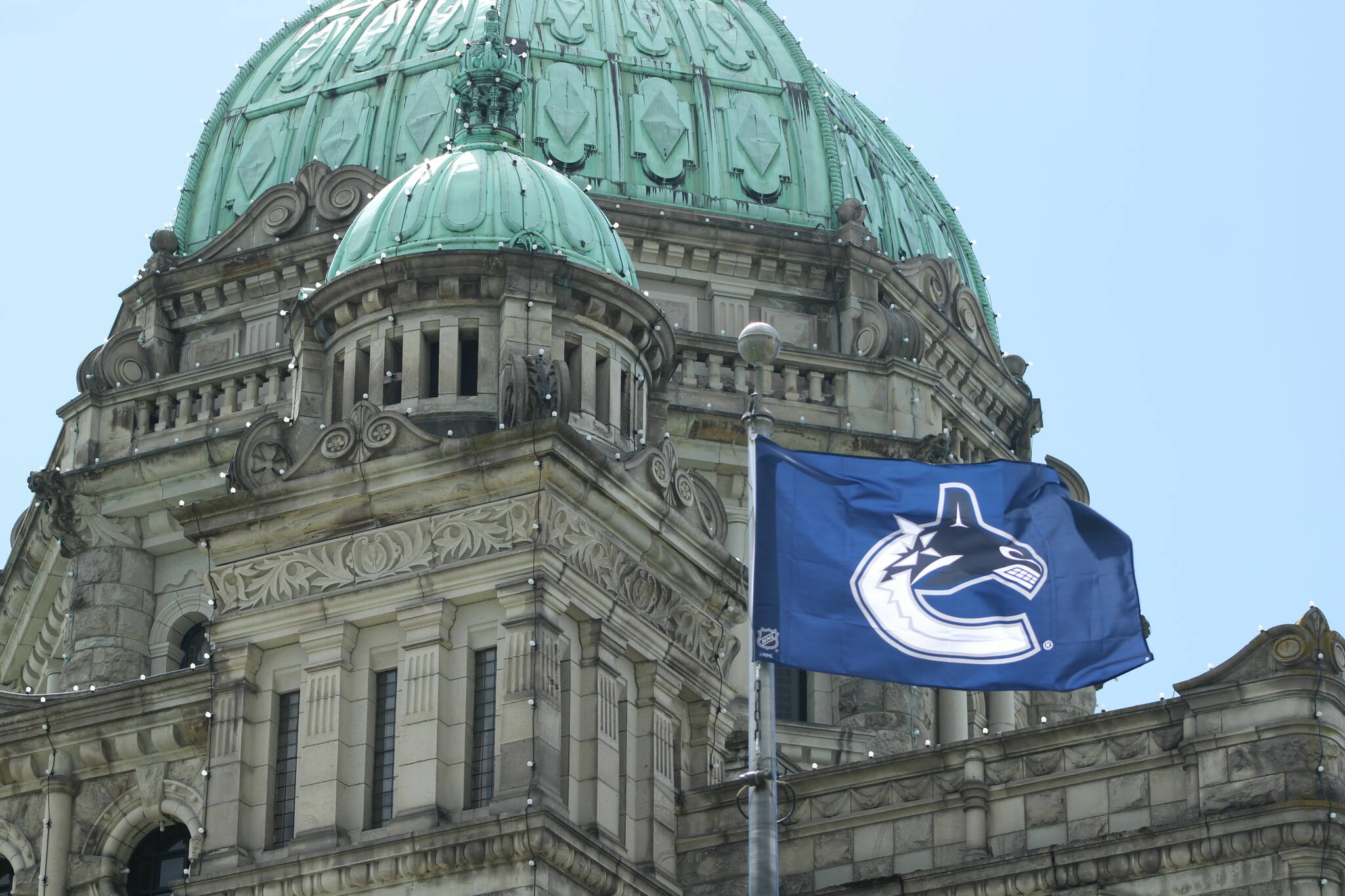 A Vancouver Canucks flag was raised at the B.C. Legislative on Tuesday, May 7. (Jake Romphf/Vic News)