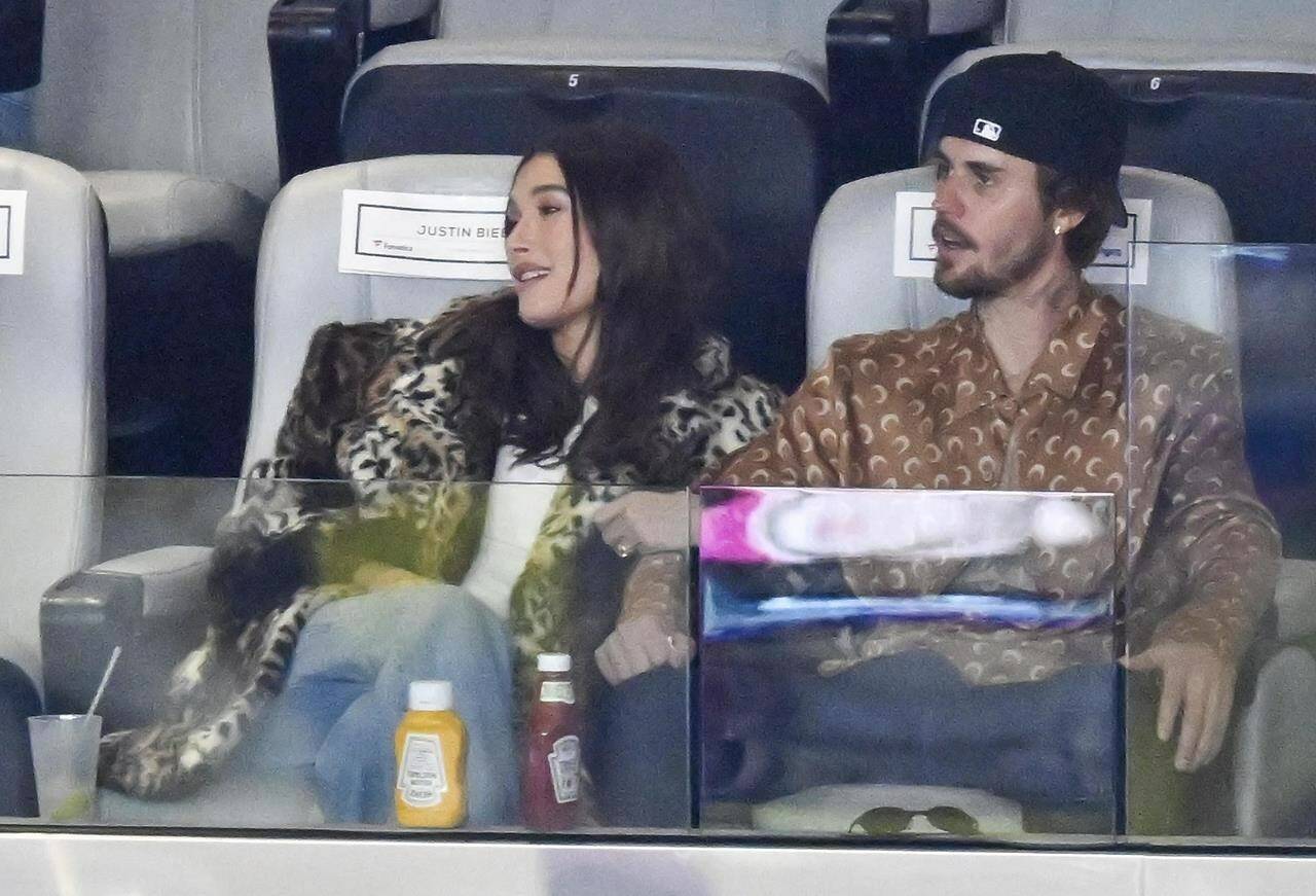 Hailey Bieber, left, and Justin Bieber attend the NFL Super Bowl 58 football game between the San Francisco 49ers and the Kansas City Chiefs, Sunday, Feb. 11, 2024, in Las Vegas. Justin and Hailey Bieber are expecting their first child. THE CANADIAN PRESS/AP-David Becker