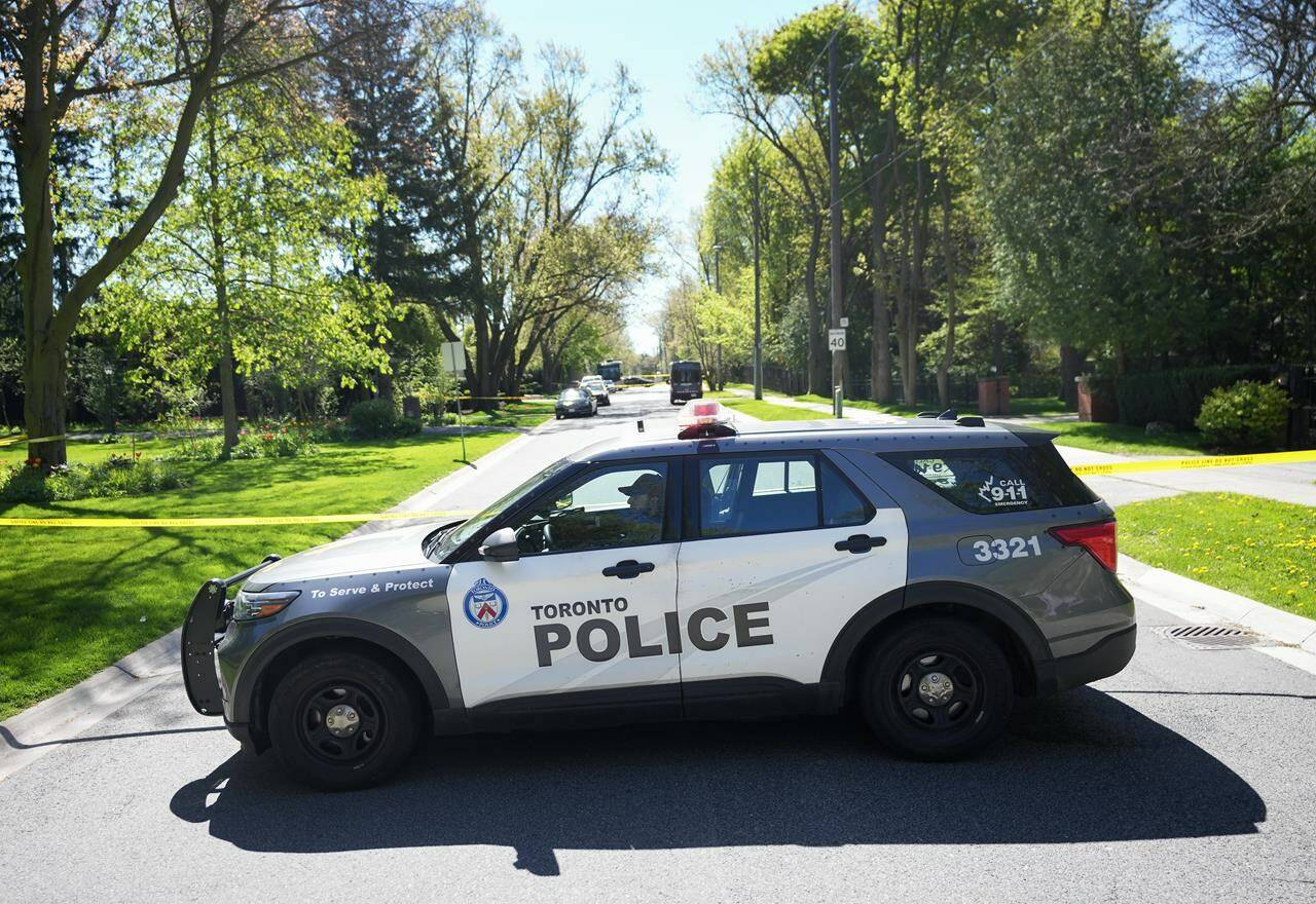 Police say an alleged trespasser at Drake’s Toronto home was sent to hospital with serious injuries after getting into an altercation with security guards. Police investigate a crime scene outside the mansion of Canadian rap artist Drake in Toronto on Tuesday, May 7, 2024. THE CANADIAN PRESS/Nathan Denette
