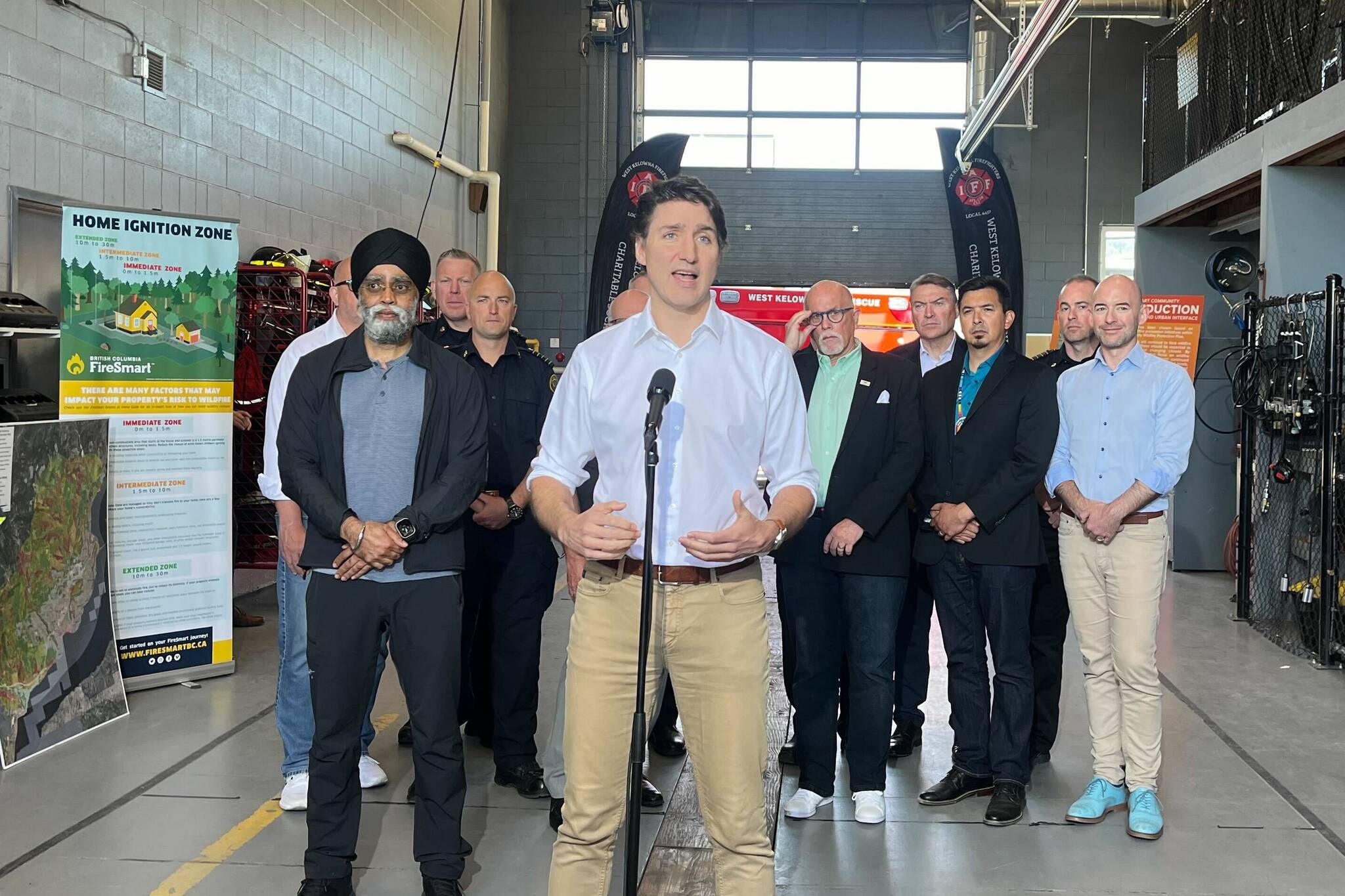 Prime Minister speaks to reporters during a visit to West Kelowna Fire Hall #31 to meet with first responders and elected officials. (Jacqueline Gelineau/Capital News)