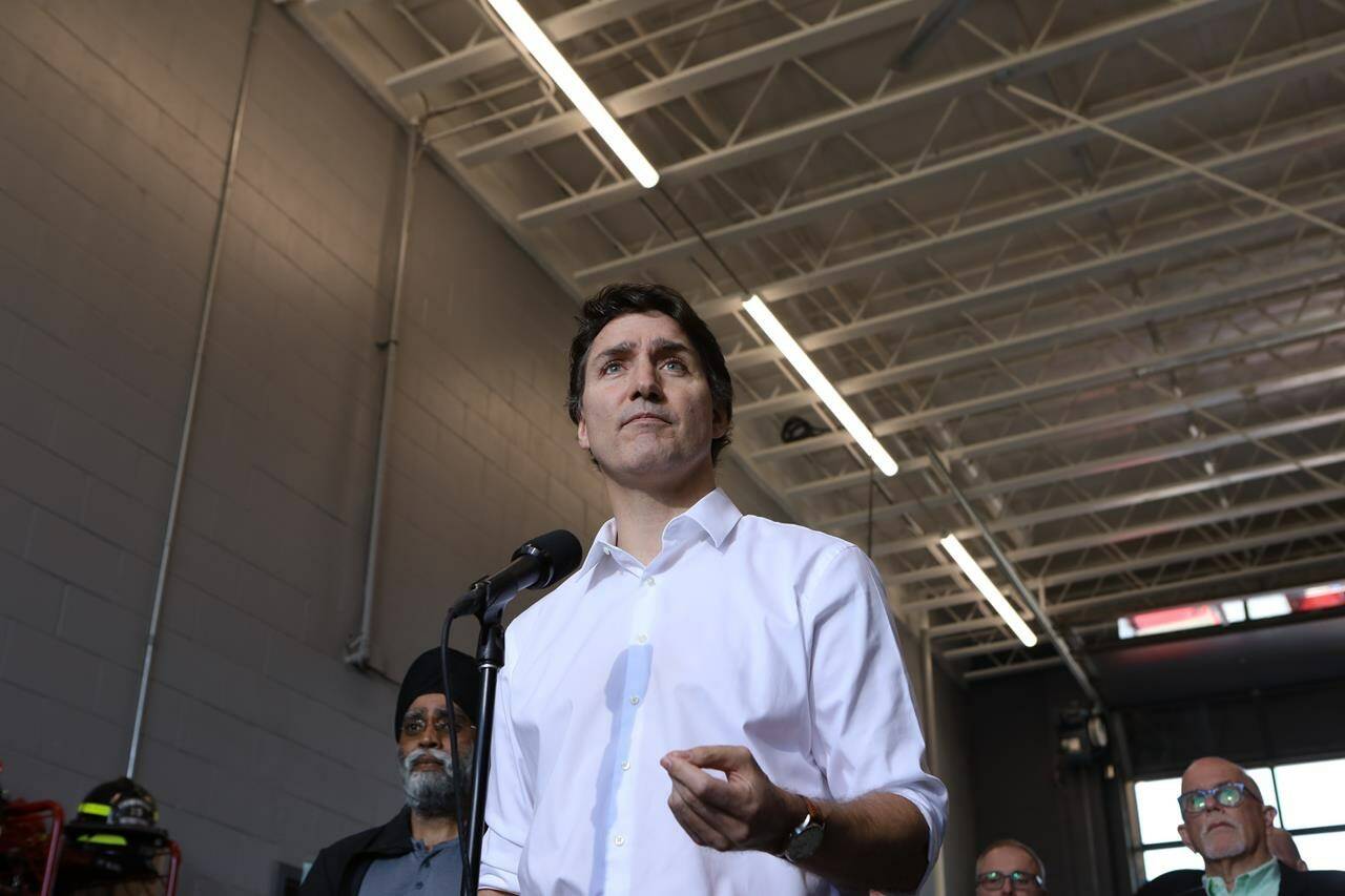 Prime Minister Justin Trudeau speaks about the upcoming wildfire season at the West Kelowna Fire Rescue hall in West Kelowna, B.C., on Friday, May 10, 2024. THE CANADIAN PRESS/Aaron Hemens