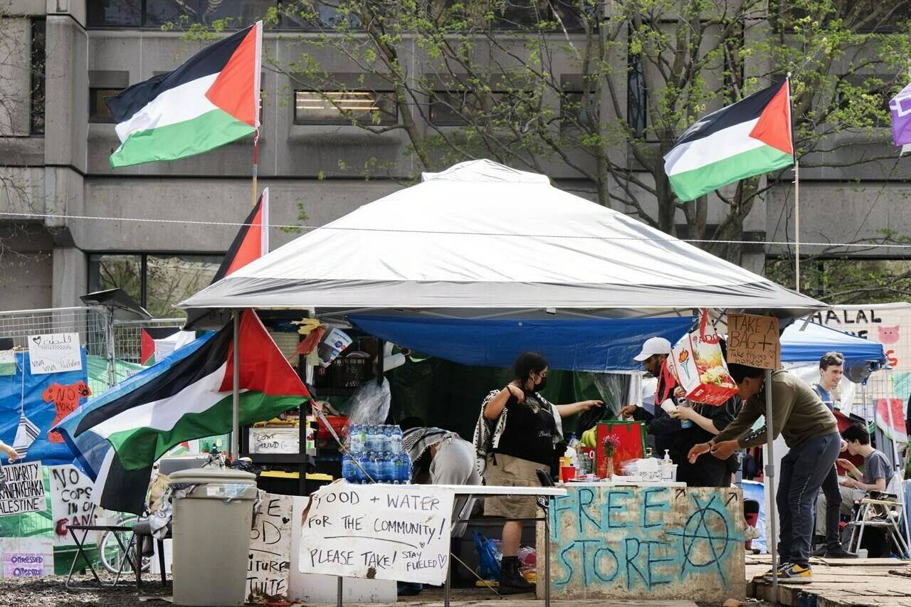 Montreal pro-Palestinian activists say they’ve set up a new encampment at the Université du Québec à Montréal, as nearby McGill University prepares to go to court to clear the protest camp that has been on its grounds since April 27. A tent with free supplies is seen at the pro-Palestinian protest encampment on McGill University campus, in Montreal, Monday, May 6, 2024. THE CANADIAN PRESS/Ryan Remiorz