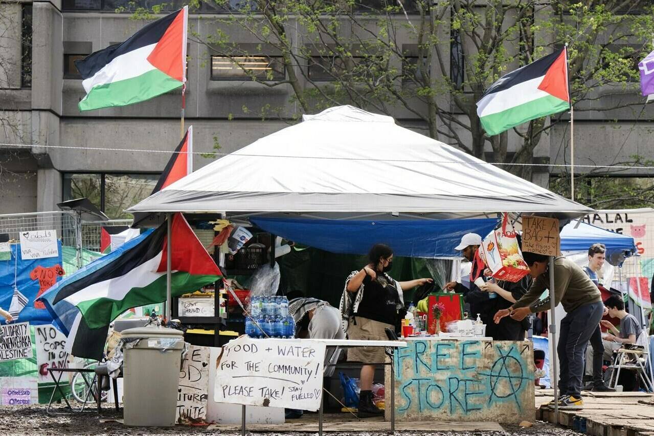 A tent with free supplies is seen at the pro-Palestinian encampment on McGill University campus Monday, May 6, 2024 in Montreal. Lawyers for McGill University will be going to court today seeking a court injunction to dismantle the pro-Palestinian encampment that has been erected on its grounds since last month. THE CANADIAN PRESS/Ryan Remiorz