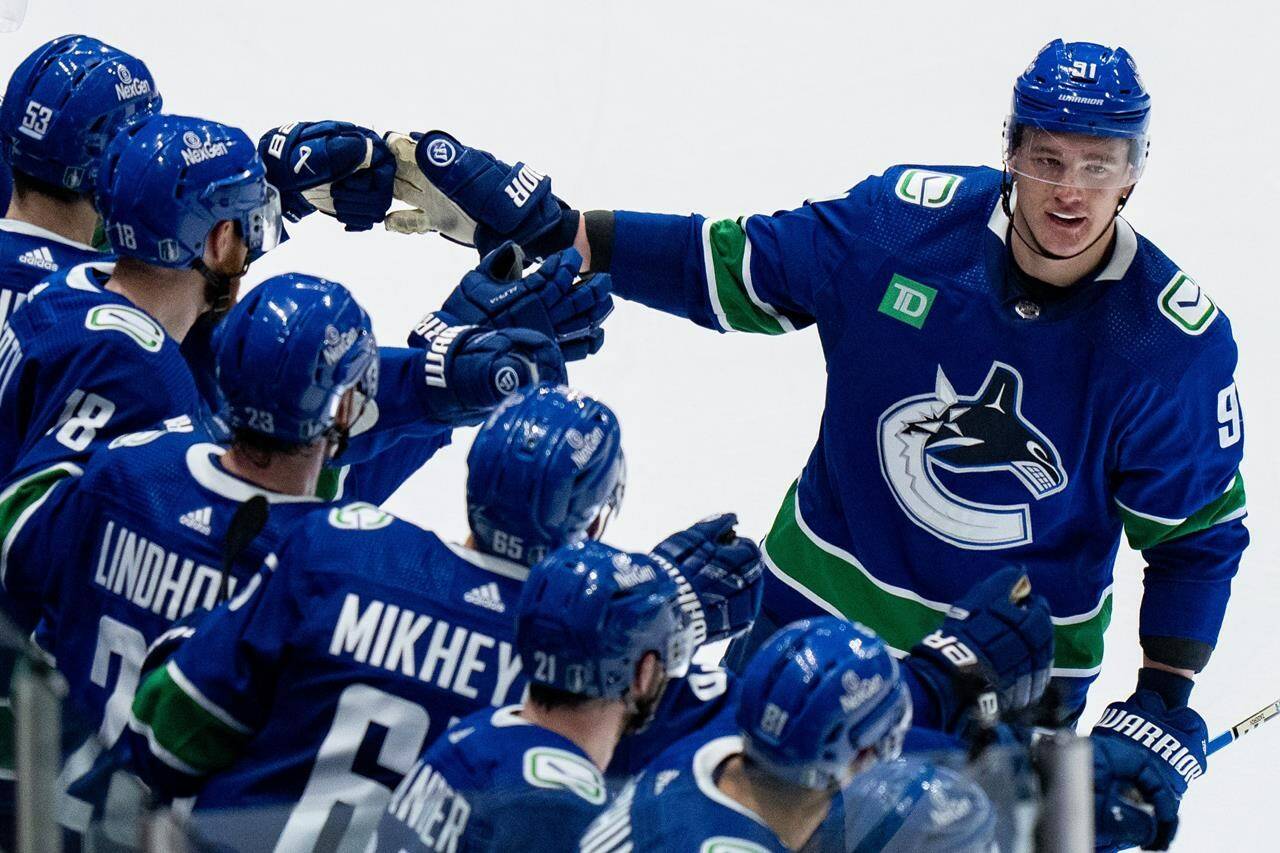 Vancouver defenceman Nikita Zadorov has been fined US$5,000 by the NHL and Canucks blue-liner Carson Soucy will have a hearing with the league for cross-checks on Edmonton superstar Connor McDavid. Zadorov celebrates with teammates after his goal against the Edmonton Oilers during the second period in Game 2 of an NHL hockey Stanley Cup second-round playoff series, in Vancouver, B.C., Friday, May 10, 2024. THE CANADIAN PRESS/Ethan Cairns