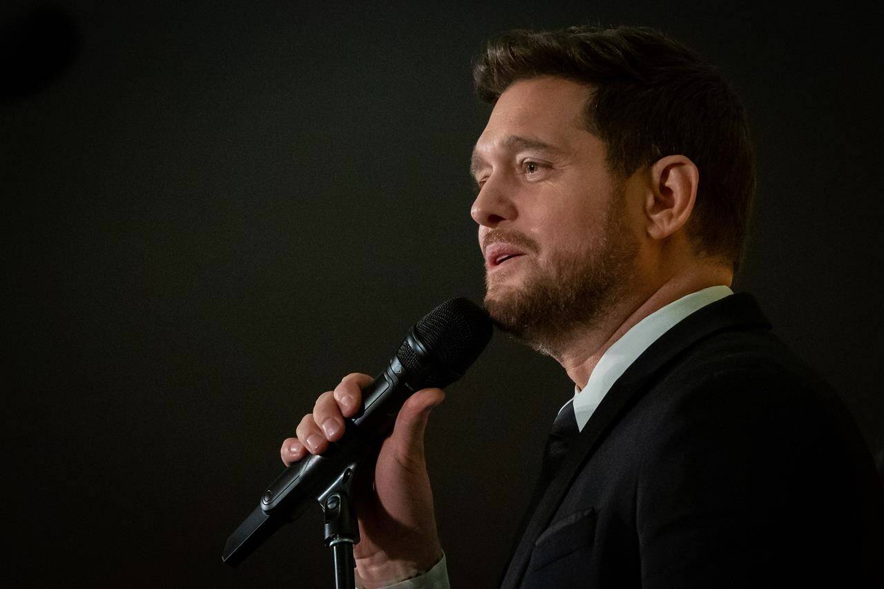 Michael Buble is taking his seat at “The Voice” this fall. Buble sings during the “One Year to Go” Invictus Games dinner in Vancouver, B.C., Friday, Feb. 16, 2024. THE CANADIAN PRESS/Ethan Cairns