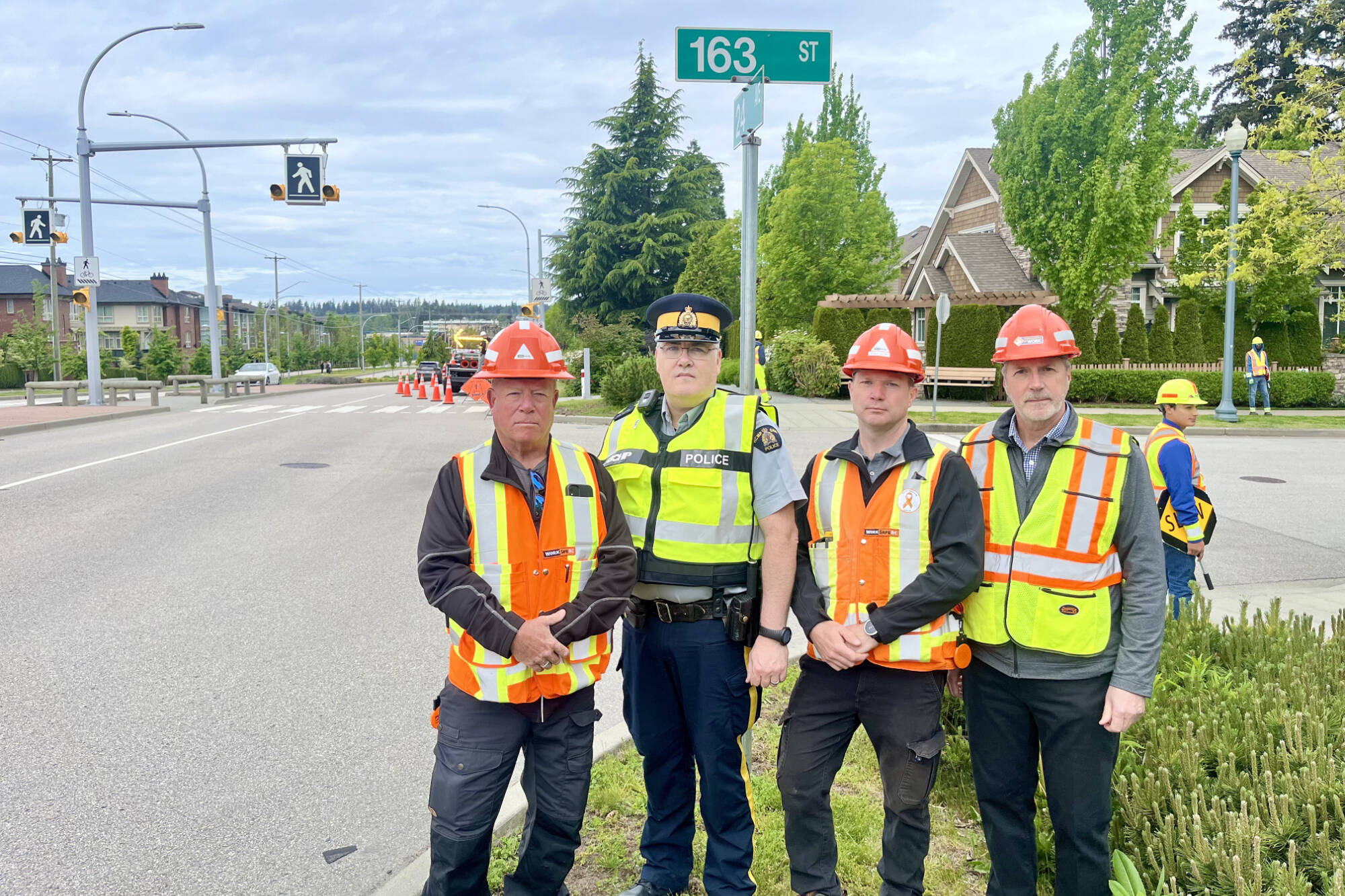 WorkSafe BC’s Jared Slind, left, BC Highway Patrol Sgt. Patrick Davies, WorkSafe BC’s Neal Randall-Smith and Trace Acres, program director of Road Safety at Work kicked off the 14th annual province-wide Cone Zone campaign Monday morning (May 13). (Tricia Weel photo)