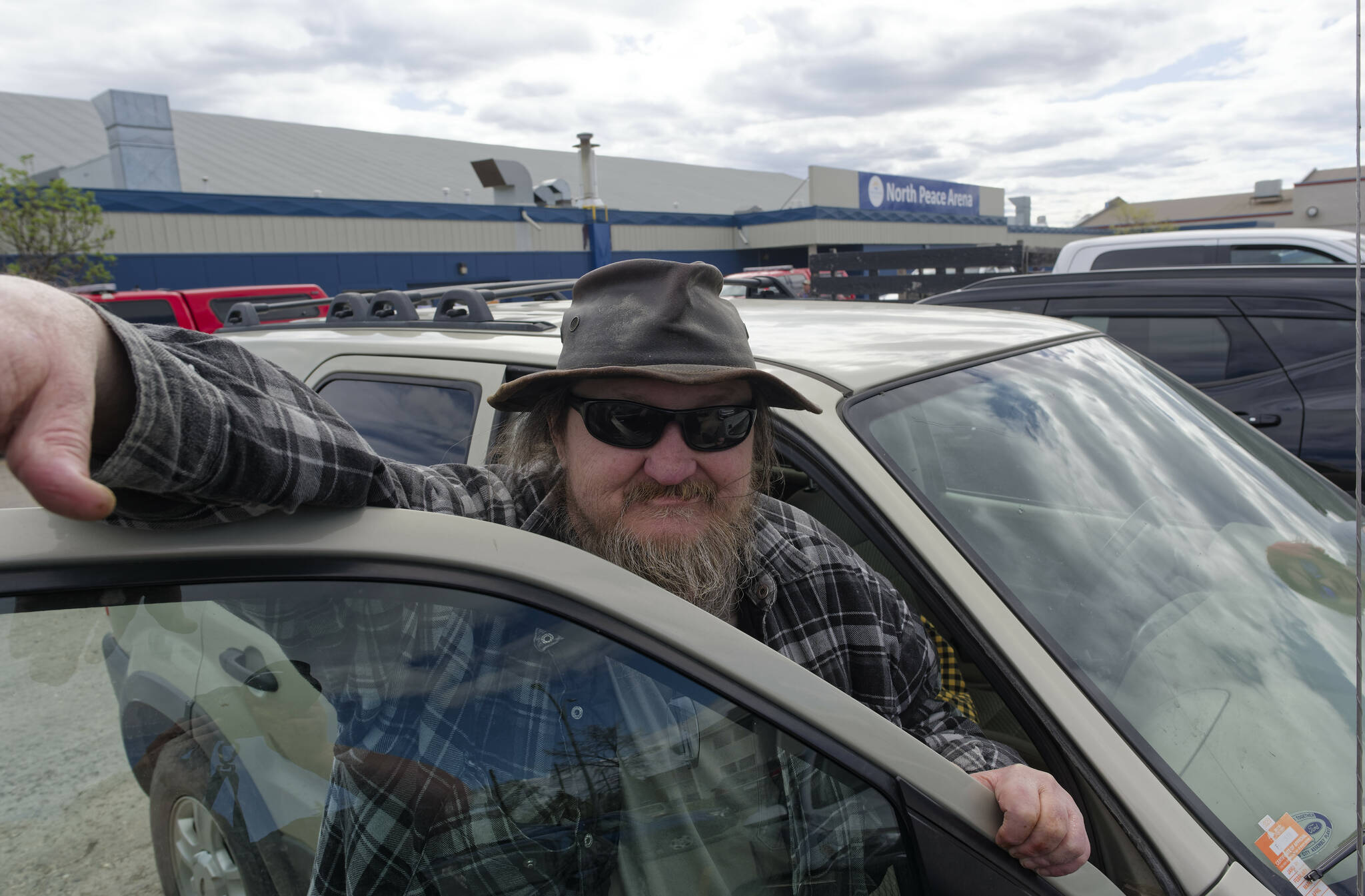 Fort Nelson, B.C. evacuee Jim Wright looks on after registering at the North Peace Arena in Fort St. John, B.C., on Monday, May 13, 2024. Wildfires are forcing more people to evacuate their homes in dry and windy northeastern B.C. THE CANADIAN PRESS/Jesse Boily