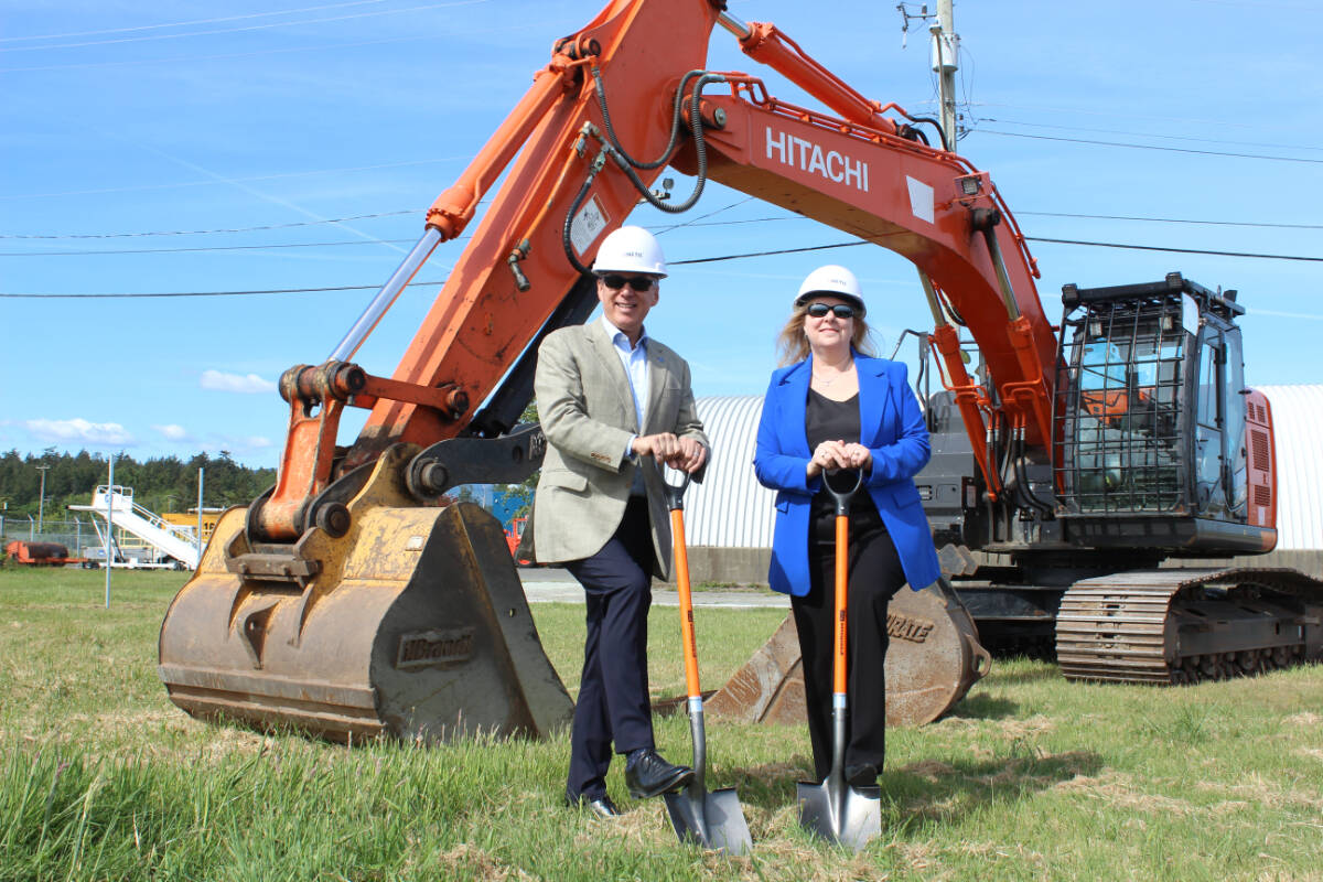 Raymond Bohn of Nav Canada and Elizabeth Brown of the Victoria Airport Authority at the groundbreaking ceremony for the new air traffic control tower. (Mark Page/News Staff)