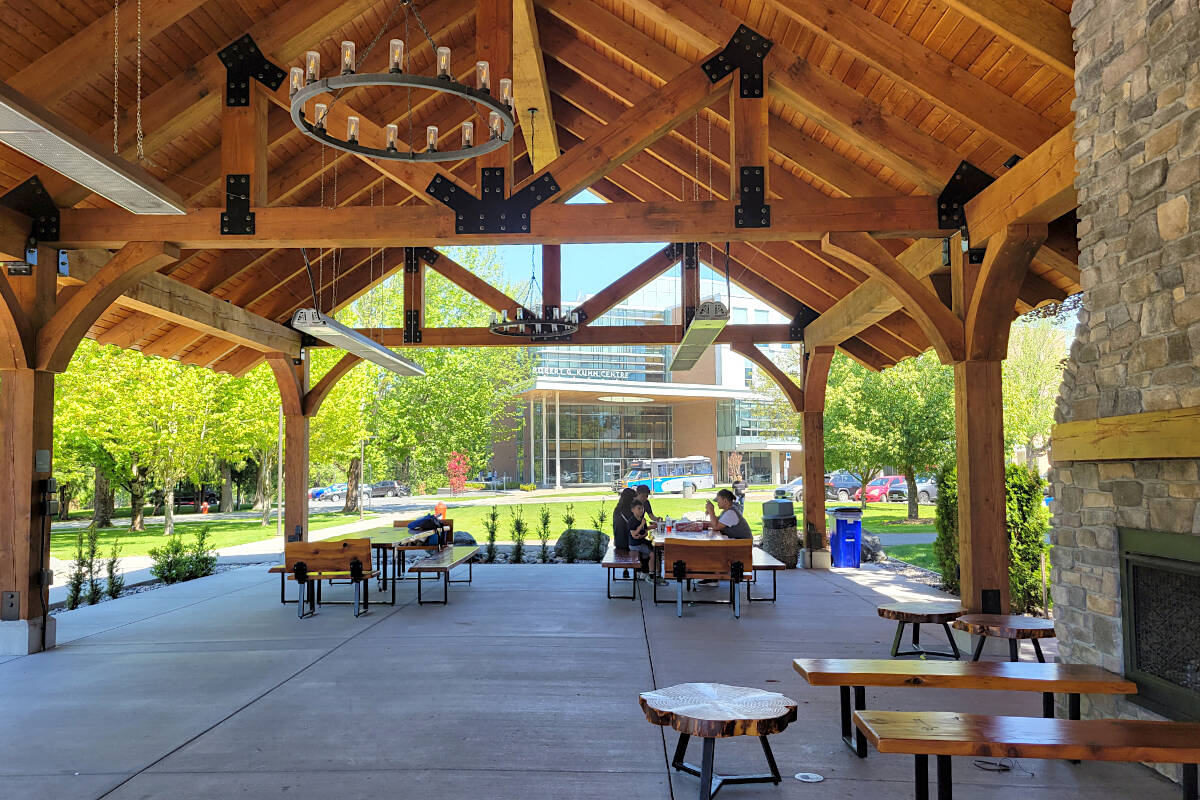 Visitors enjoyed some shade at Trinity Western University’s Langley campus in May of 2023. Staff at the university ratified their first collective agreement, a May announcement said. (Dan Ferguson/Langley Advance Times)
