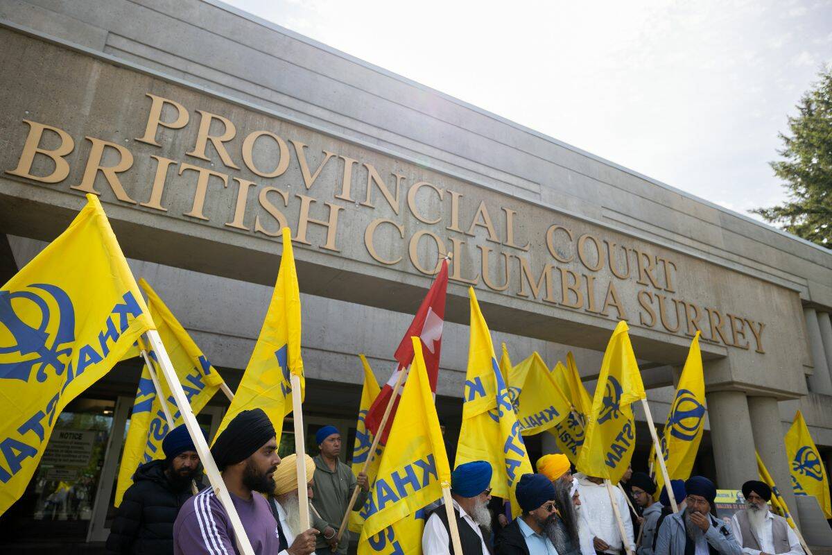Demonstrators outside the first court appearance of Amandeep Singh in Surrey on Wednesday, May 15, 2024. Singh has been charged in connection with the killing of Hardeep Singh Nijjar in June 2023 (Photo: Anna Burns)