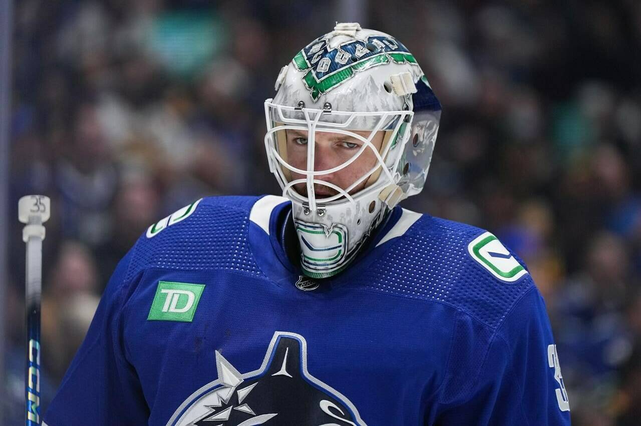 Vancouver Canucks goalie Thatcher Demko skates to the corner during a stoppage in play during the second period in Game 1 of an NHL hockey Stanley Cup first-round playoff series against the Nashville Predators in Vancouver on April 21, 2024. THE CANADIAN PRESS/Darryl Dyck