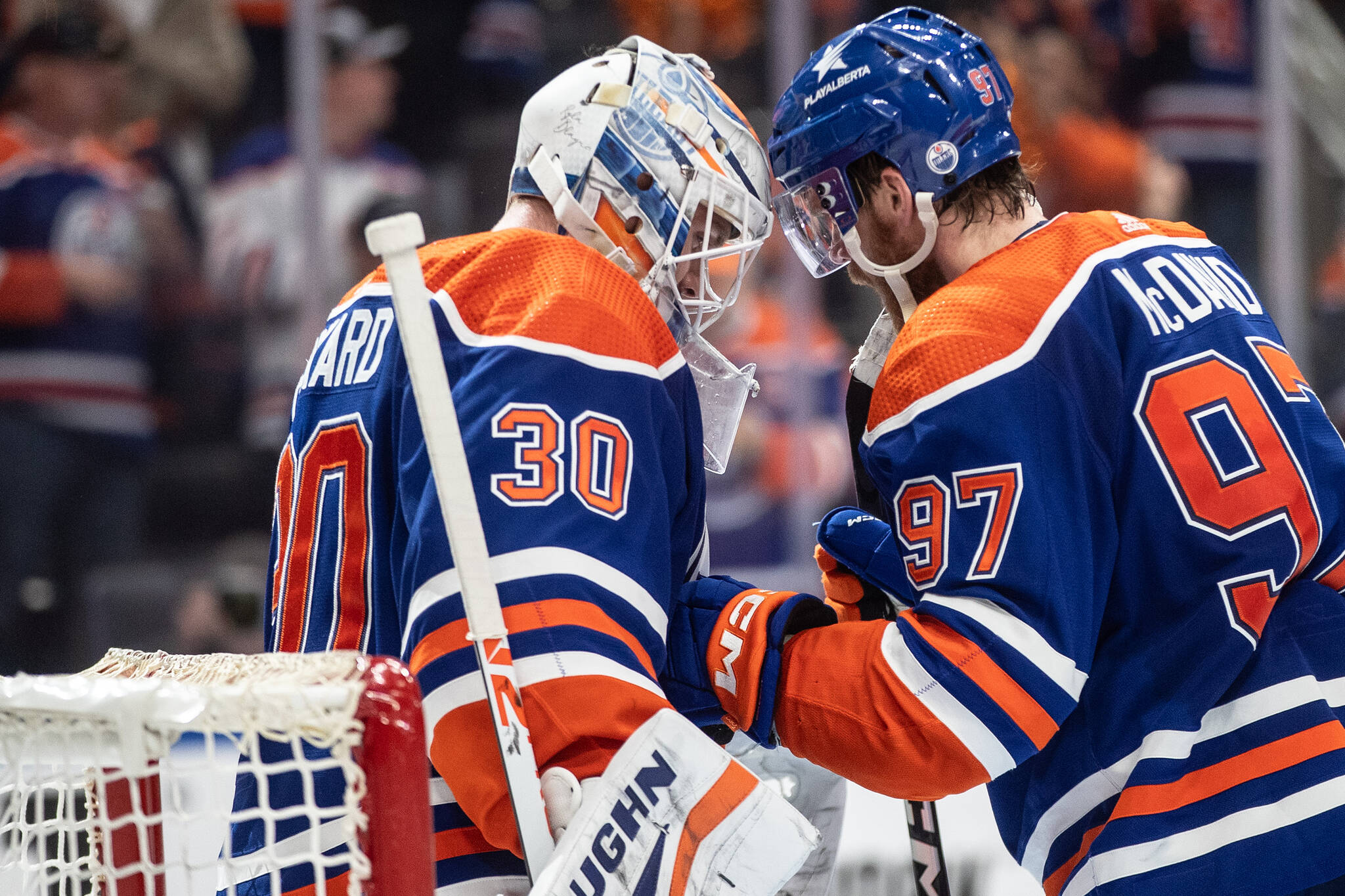 Edmonton Oilers goalie Calvin Pickard (30) and Connor McDavid (97) celebrate the win over the Vancouver Canucks during second-round NHL playoff action in Edmonton on Tuesday May 14, 2024.THE CANADIAN PRESS/Jason Franson