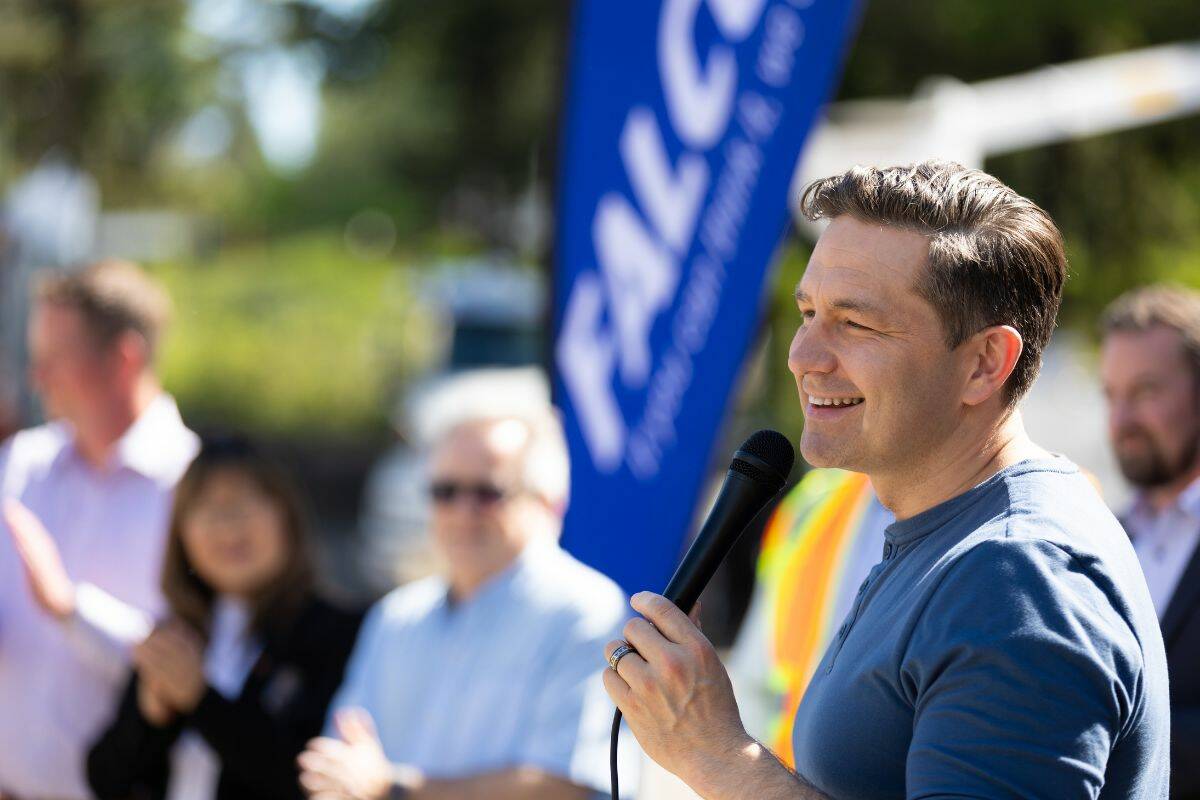 Pierre Poilievre speaks to a crowd of employees and supporters during his visit to Falcon Equipment in Surrey on Wednesday, May 15, 2024. (Photo: Anna Burns)