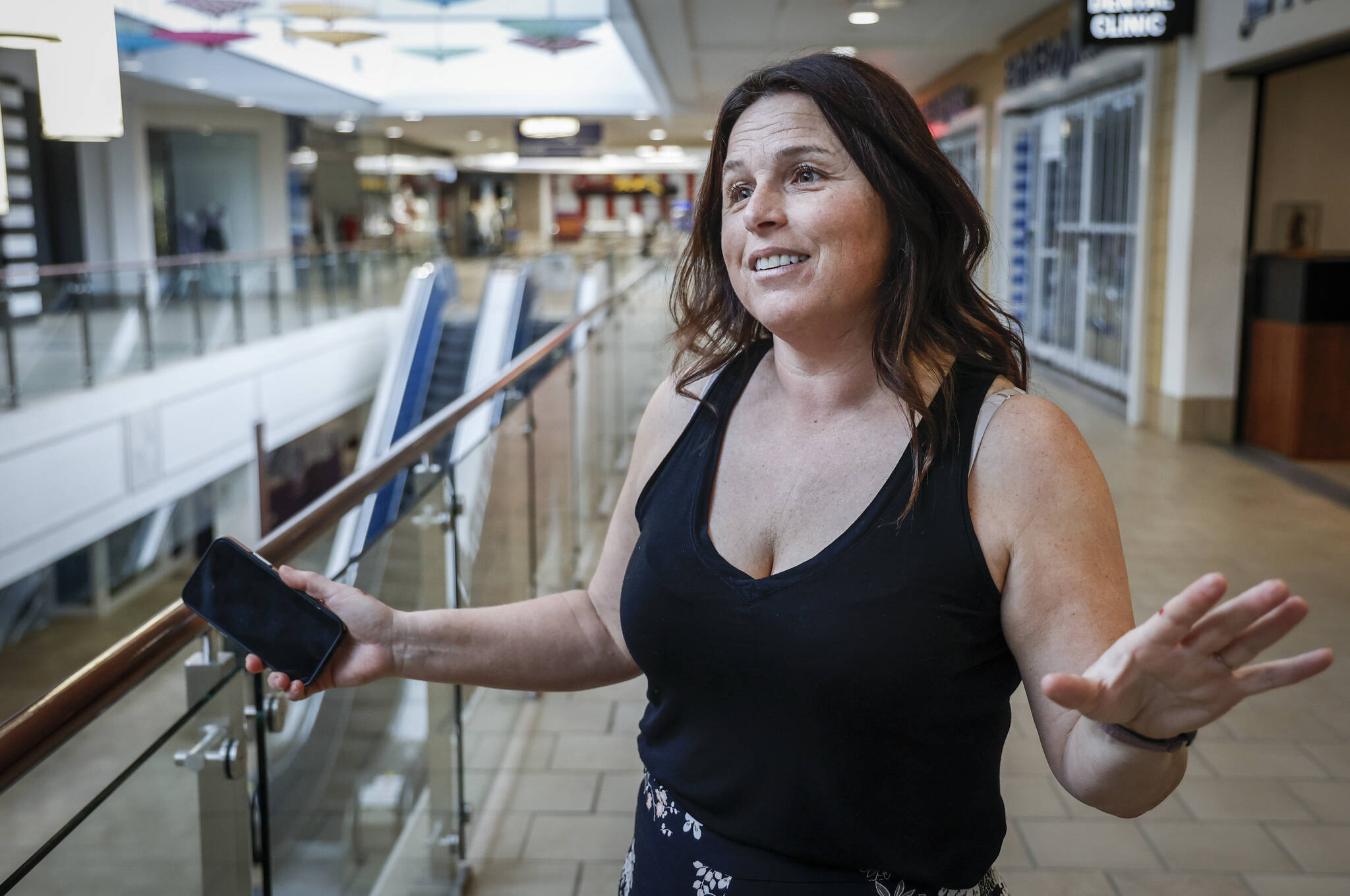 Shauna Hannam, specialty leasing manager of the Peter Pond Mall, gestures during an interview about the effect of wildfires on businesses in Fort McMurray, Alta., Thursday, May 16, 2024.THE CANADIAN PRESS/Jeff McIntosh
