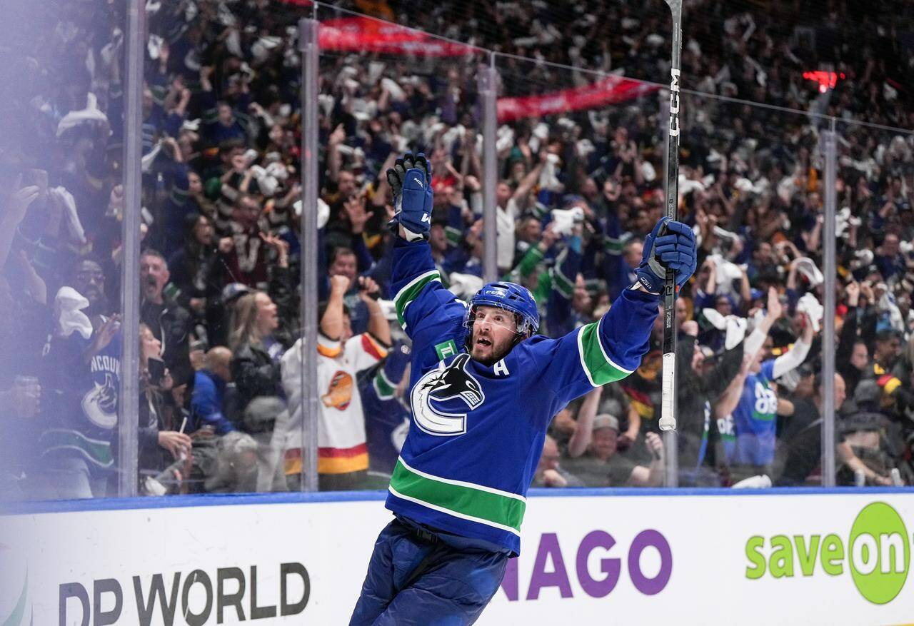 Vancouver Canucks’ J.T. Miller celebrates after scoring the winning goal against the Edmonton Oilers during the third period in Game 5 of an NHL hockey Stanley Cup second-round playoff series, in Vancouver, on Thursday, May 16, 2024. THE CANADIAN PRESS/Darryl Dyck