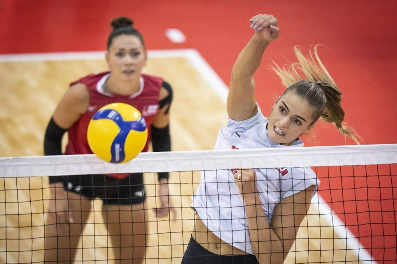 Canada’s Kiera Van Ryk spikes the ball in her team’s bronze medal victory over Cuba in the the 2023 NORCECA Senior Womenճ Volleyball Continental Championship, in Quebec City in a Sunday, Sept. 3, 2023, handout photo. THE CANADIAN PRESS/HO-Norceca, Mathieu Belanger, *MANDATORY CREDIT*
