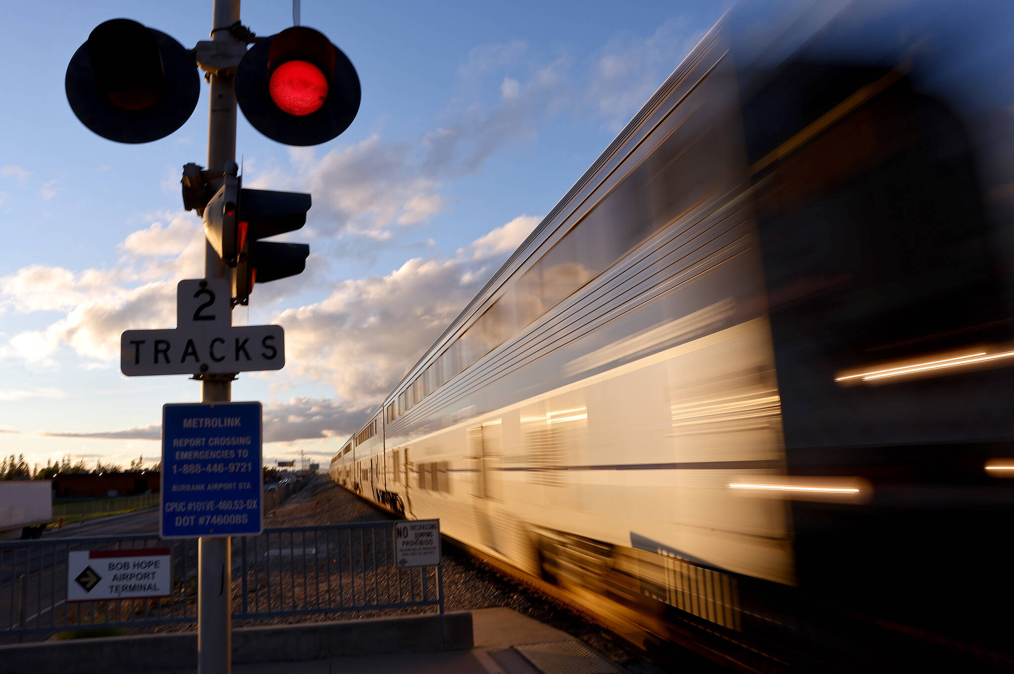 An Amtrak train arrives at a station stop on Dec. 9, 2021, in Burbank, Calif. Passenger rail advocates want to revive the Amtrak line between Mobile, Ala., and New Orleans that was shut down after Hurricane Katrina in 2005. Mario Tama | Getty Images | TNS