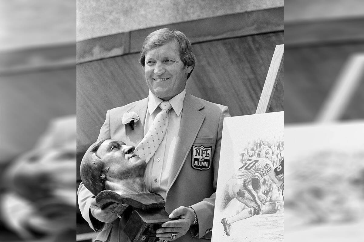 Jim Otto, former center for the Oakland Raiders, poses with his bust after enshrinement in the Pro Football Hall of Fame in Canton, Ohio, Aug. 2, 1980. Otto, the Hall of Fame center known as “Mr. Raider” for his durability through a litany of injuries, has died, the team confirmed Sunday night, May 19, 2024. He was 86. (AP Photo, File)