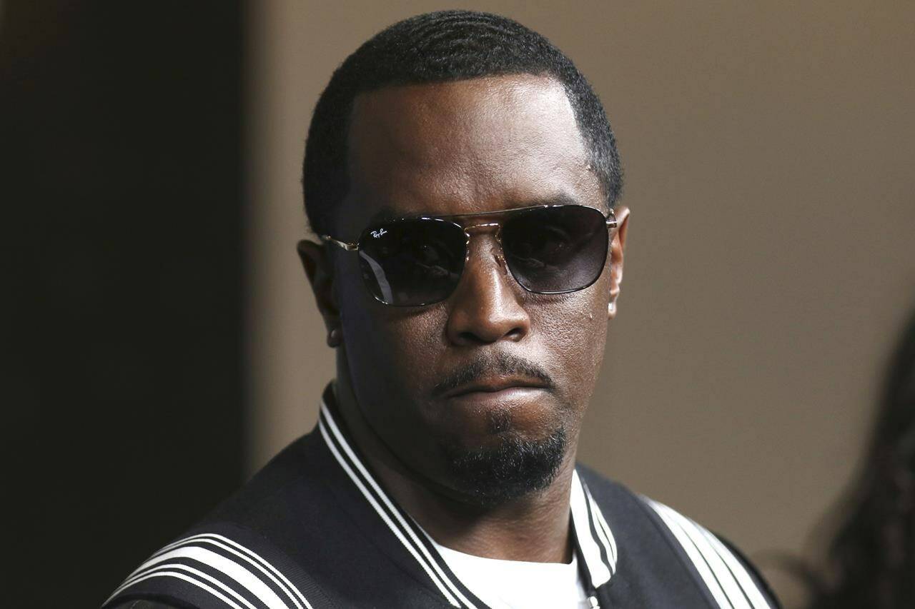 FILE - Sean “Diddy” Combs arrives at the LA Premiere of “The Four: Battle For Stardom” at the CBS Radford Studio Center on May 30, 2018, in Los Angeles. Newly released video Friday, May 17, 2024, appears to show Combs beating his former singing protege and girlfriend Cassie in a Los Angeles hotel in 2016. (Photo by Willy Sanjuan/Invision/AP, File)