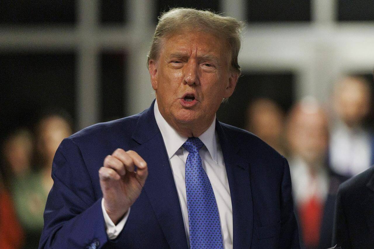 Former President Donald Trump speaks to the media after attending the day’s proceedings at his hush money trial, in New York, Monday, May 20, 2024. (Sarah Yenesel/Pool Photo via AP)