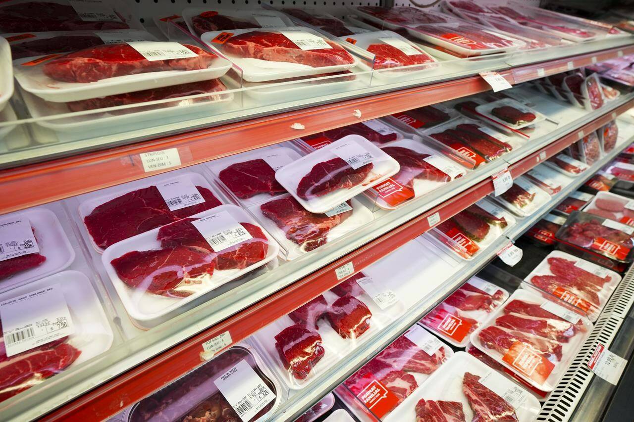 Statistics Canada says food prices drove inflation lower in April, with the cost of groceries rising 1.4 per cent compared with a year ago. Beef and meat products are displayed for sale at a grocery store in Aylmer, Que., on Thursday, May 26, 2022. THE CANADIAN PRESS/Sean Kilpatrick