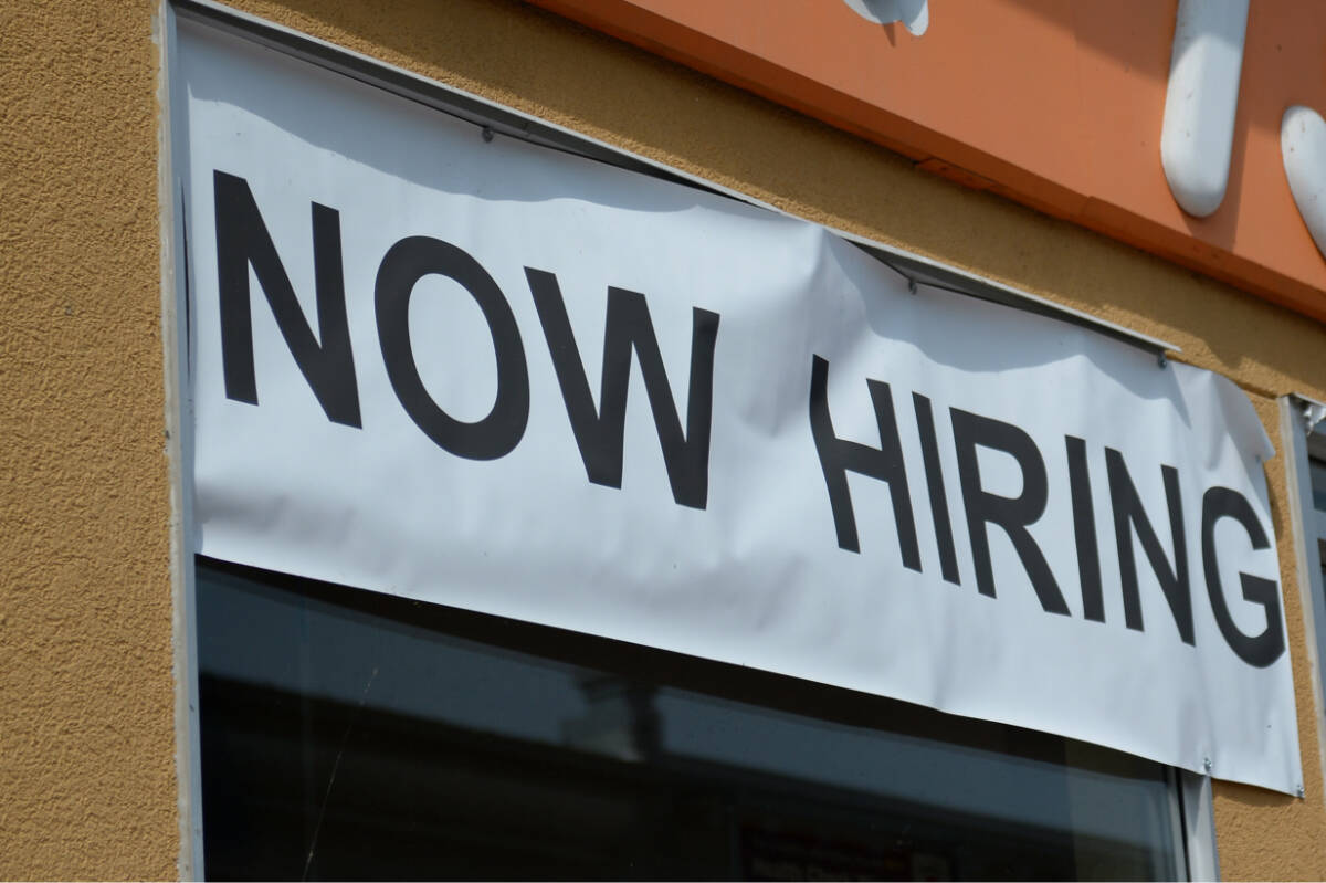 A ‘Now Hiring’ sign is displayed on the window of a business in Lanark County, Ontario on Tuesday, July 7, 2015. In B.C., employers making job listing online are required to include pay information as of November 2023. Since then, job site Indeed says it’s seen a large uptick in the number of postings doing so. THE CANADIAN PRESS/Sean Kilpatrick
