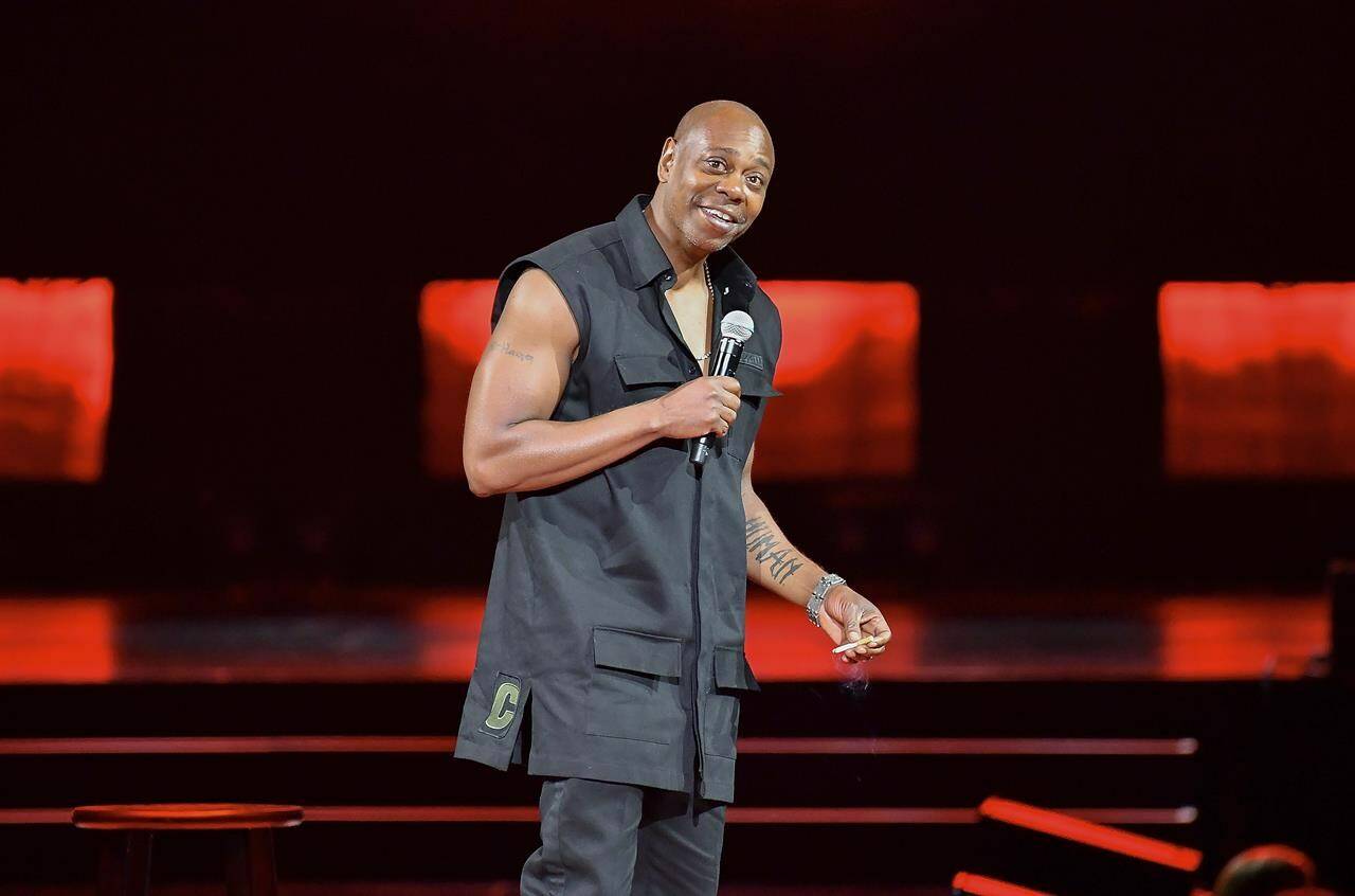 FILE - Comedian Dave Chappelle performs at Madison Square Garden during his 50th birthday celebration week on Tuesday, Aug. 22, 2023, in New York. American comedian Dave Chappelle called the Israeli war on Hamas in the Gaza Strip a “genocide” Thursday, May 23, 2024, to cheers while performing in the capital of the United Arab Emirates, while urging Americans to fight antisemitism so Jews don’t feel like they need to be protected by Israel. (Photo by Evan Agostini/Invision/AP, File)