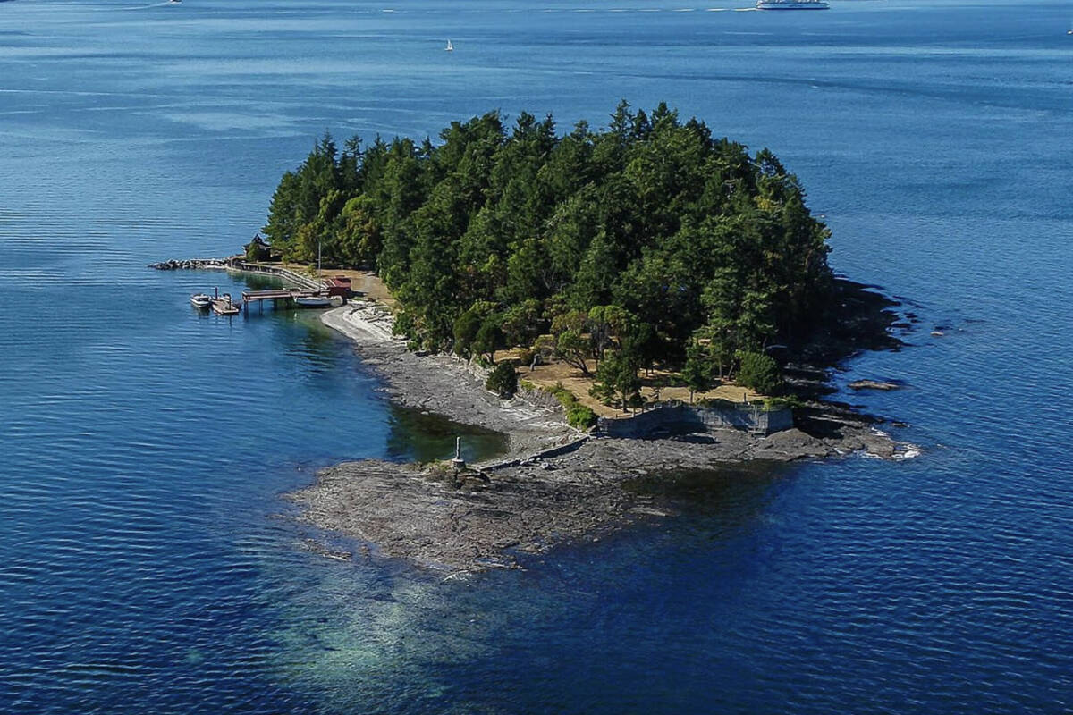 A private island off Swartz Bay is up for sale, which includes a main house, five cottages, 2,700 feet of ocean frontage and a tennis court. (Victoria Luxury Group)