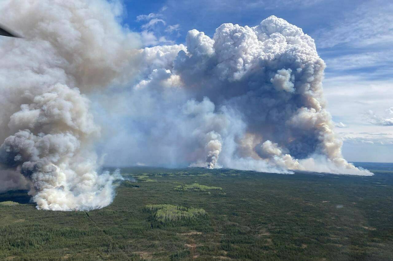 The west flank of the Parker Lake wildfire, designated G90267 by the B.C. Wildfire Service, is seen from the air looking east in an undated handout photo. THE CANADIAN PRESS/HO-BC Wildfire Service