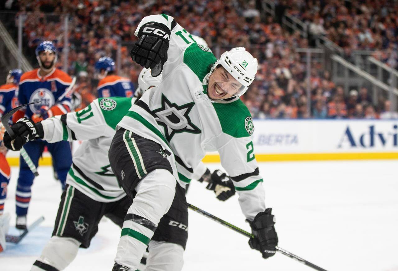 Dallas Stars left wing Jason Robertson (21) celebrates a goal against the Edmonton Oilers during third period third-round NHL playoff action in Edmonton on Monday May 27, 2024. THE CANADIAN PRESS/Jason Franson