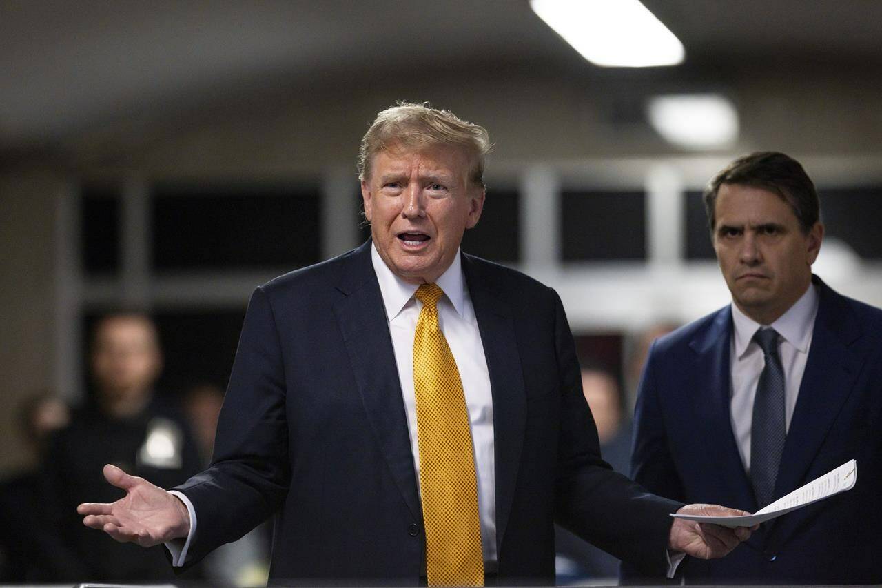 Former President Donald Trump speaks alongside his attorney Todd Blanche following the day’s proceedings in his trial Tuesday, May 21, 2024, in Manhattan Criminal Court in New York. (Justin Lane/Pool Photo via AP)