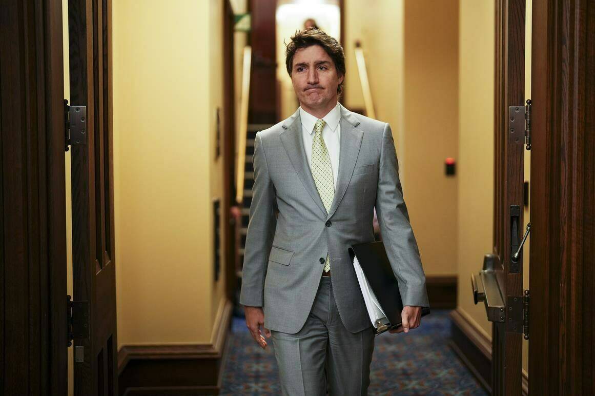 Prime Minister Justin Trudeau makes his way to talk to reporters in the foyer of the House of Commons on Parliament Hill in Ottawa on Tuesday, May 28, 2024. Trudeau is announcing the opening of a major vaccine production plant in Toronto today — part of Canada’s efforts to build up the domestic biomanufacturing sector in the aftermath of the COVID-19 pandemic. THE CANADIAN PRESS/Sean Kilpatrick